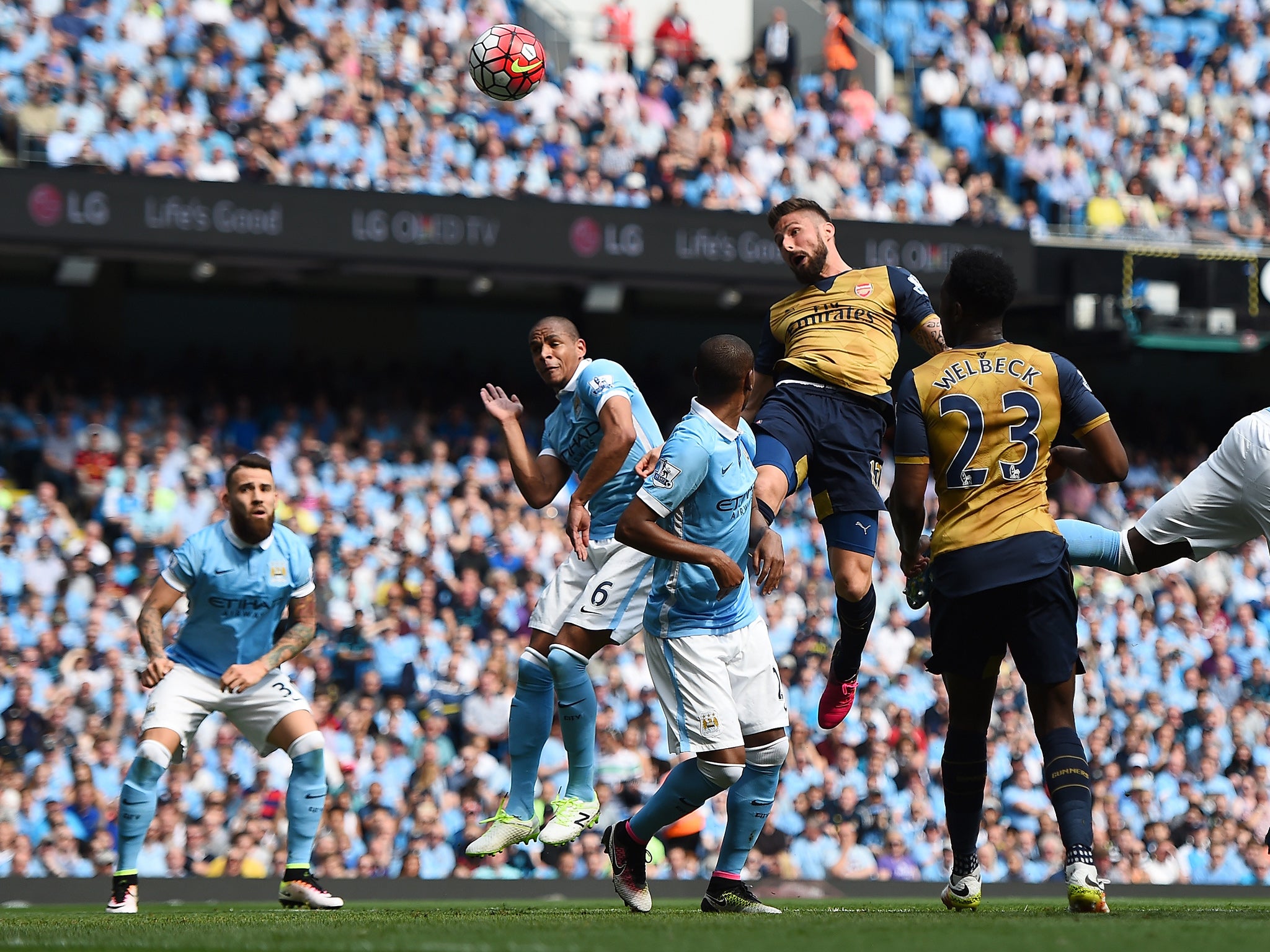 Olivier Giroud heads in Arsenal's first goal of the game