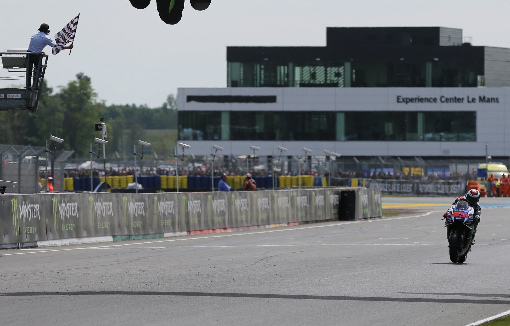 Jorge Lorenzo crosses the finish line to win the MotoGP French Grand Prix