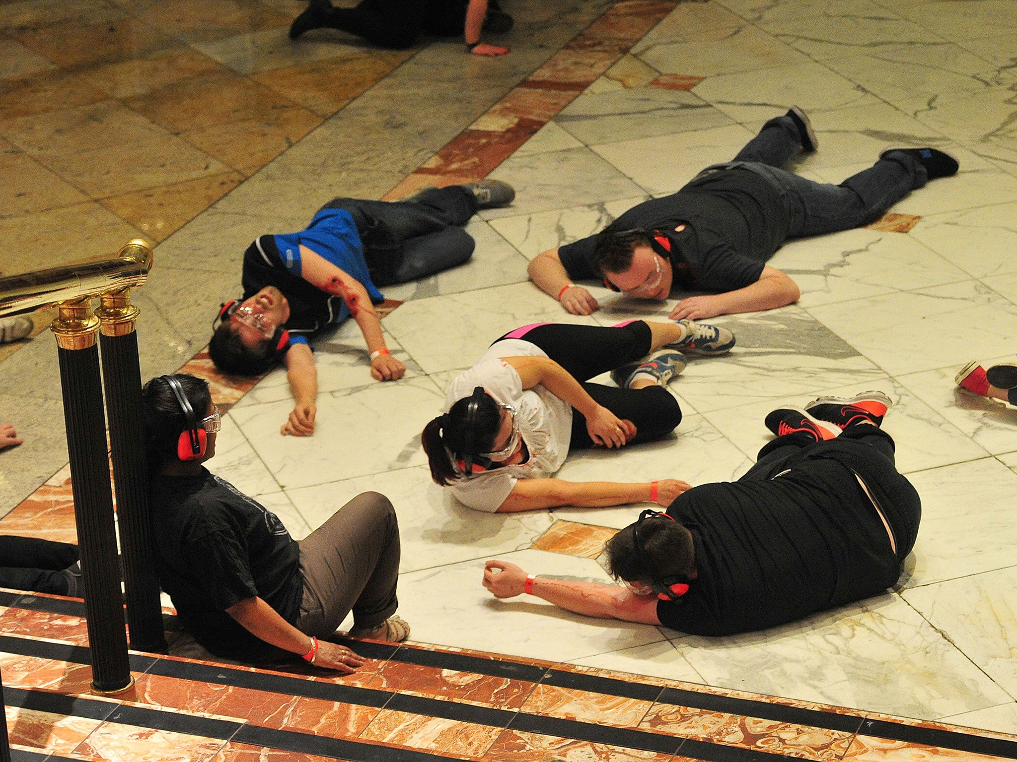 Emergency services and volunteers take part in a simulated terror attack at the Trafford Centre in Manchester on 10 May 2016.