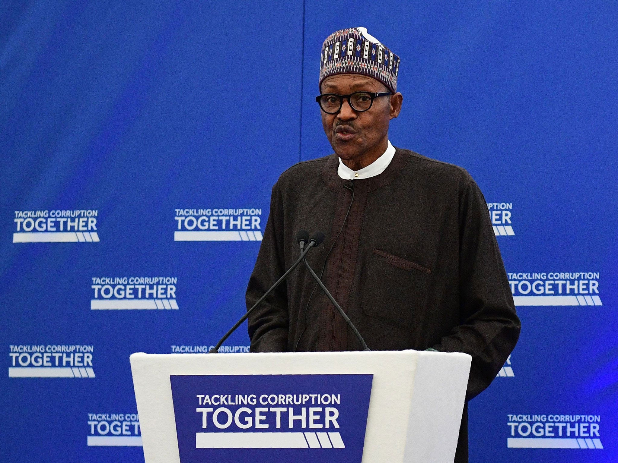 Nigerian President Muhammadu Buhari addresses delegates at the start of a conference to tackle corruption at the Commonwealth Secretariat in London on May 11, 2016