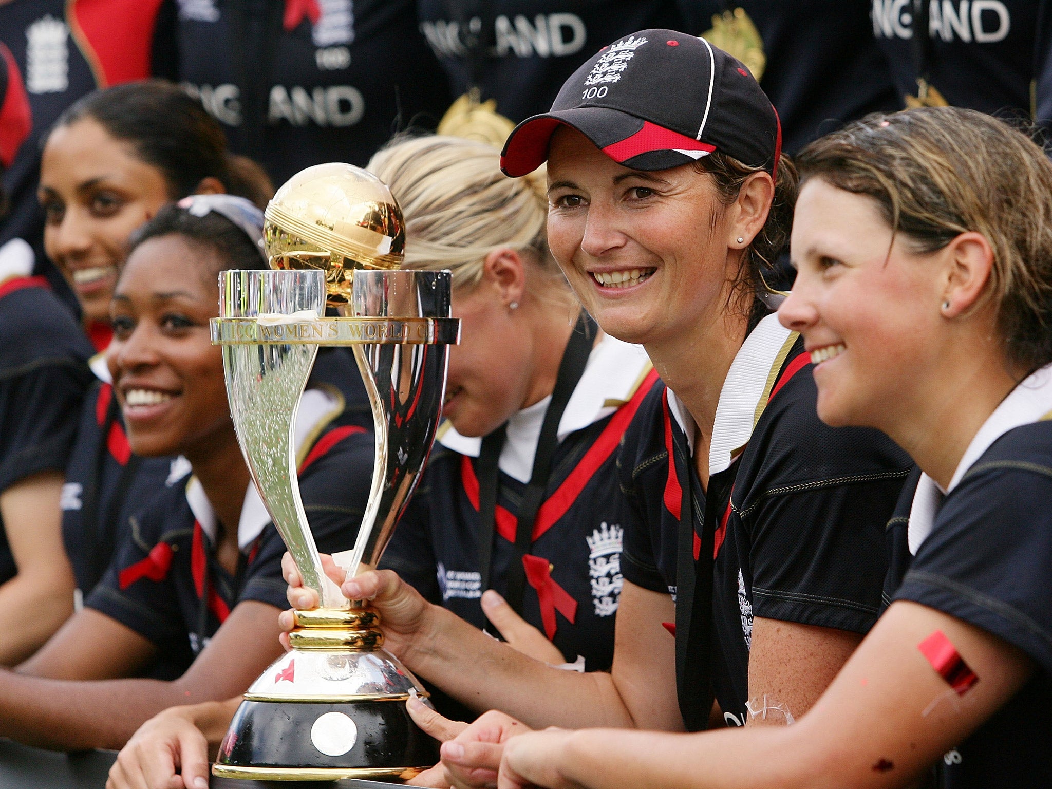 
Edwards celebrates with teammates after winning the 2009 World Cup 