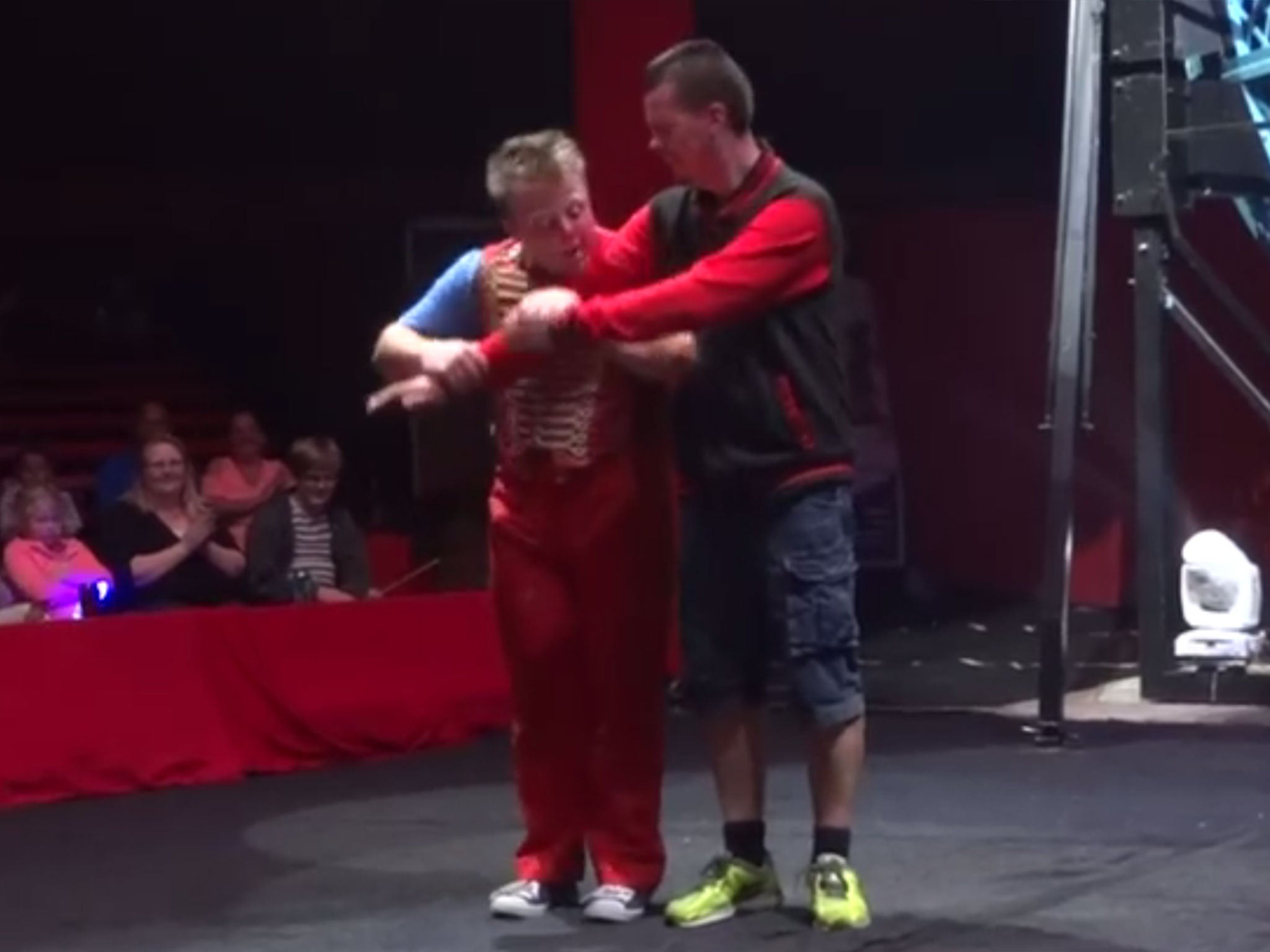 Ben Garnham on stage with the clown just before it goes badly wrong