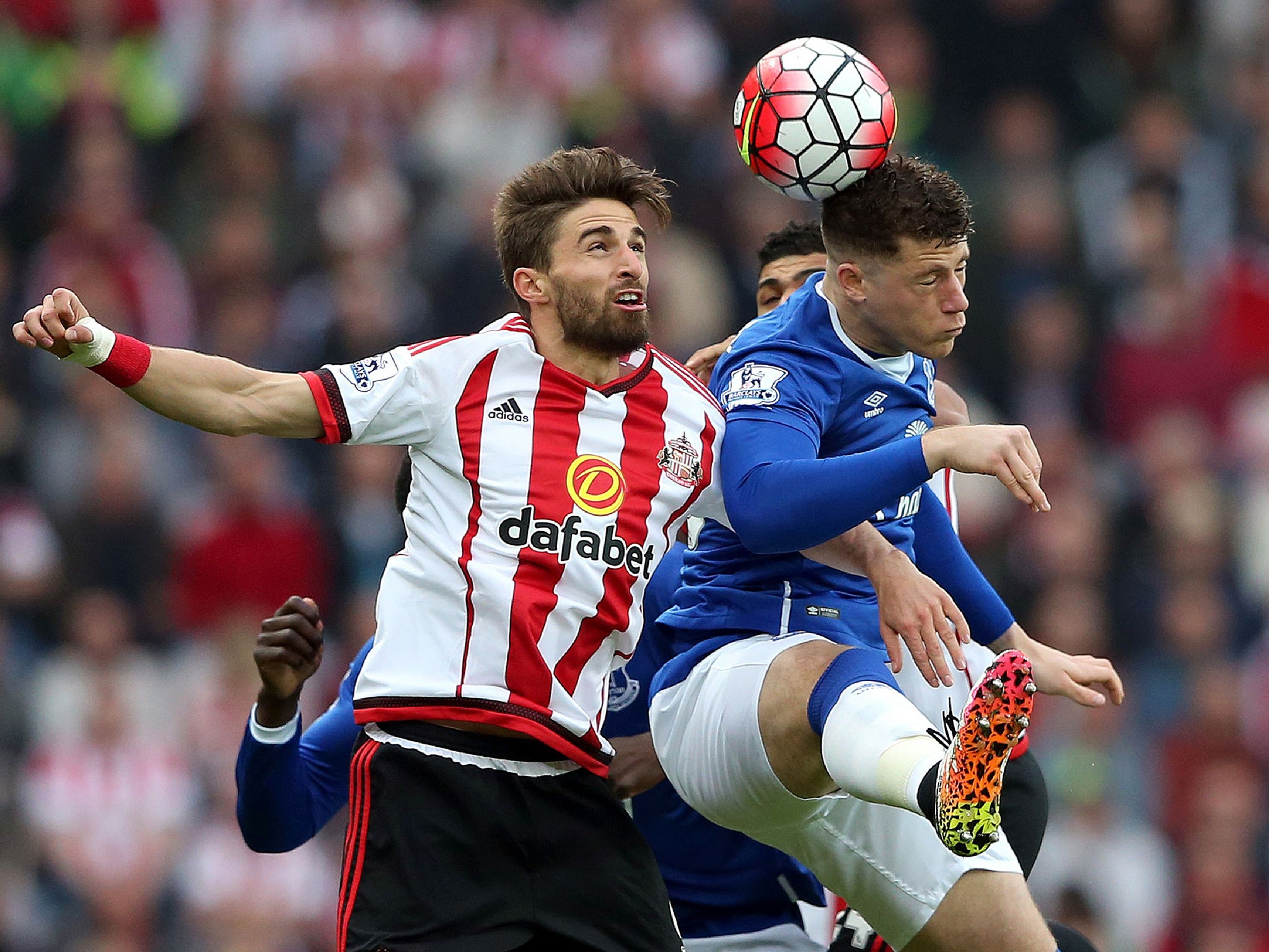 Fabio Borini battles with Ross Barkely for the ball