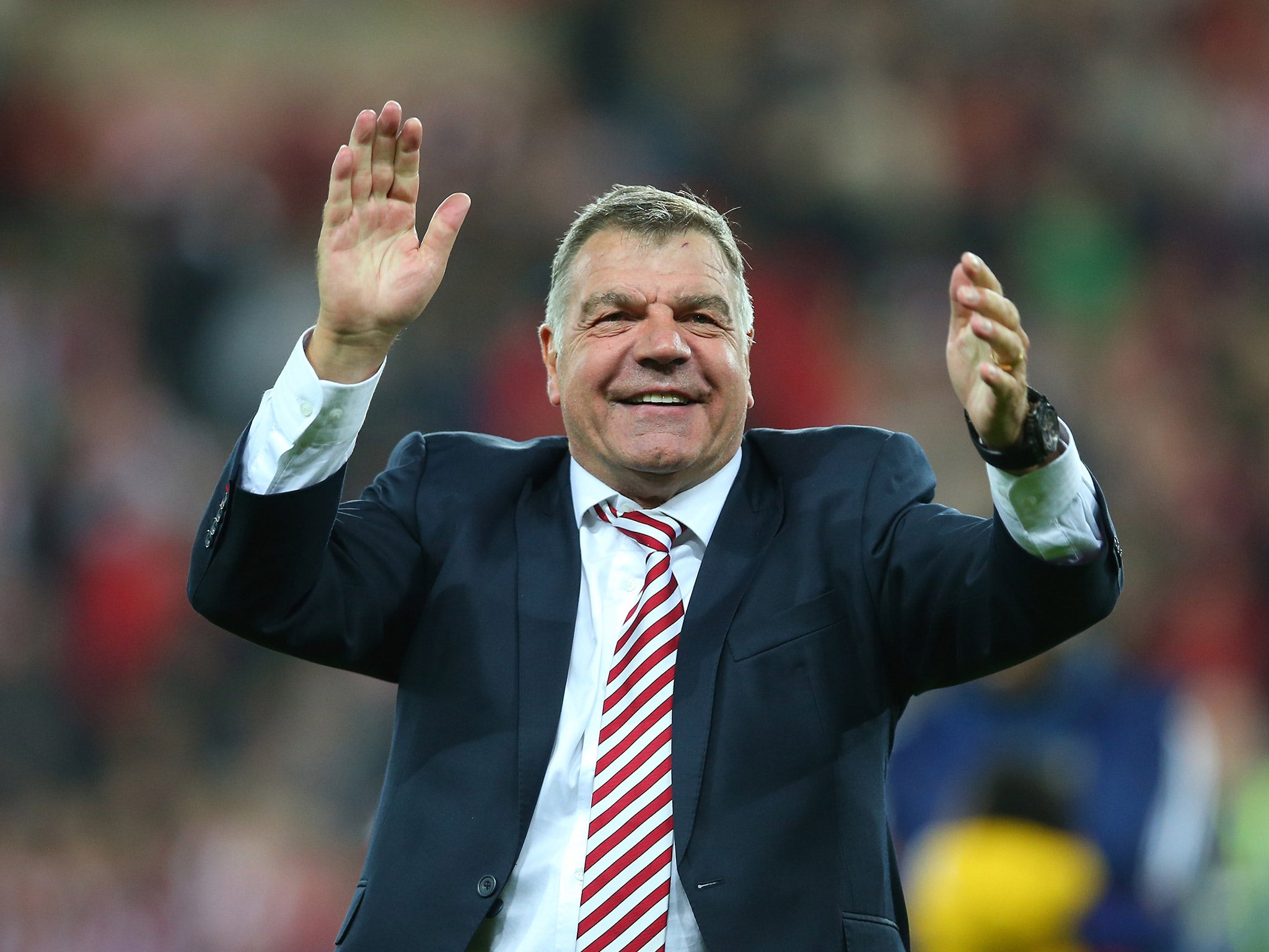 Sam Allardyce celebrates Sunderland's Premier League survival