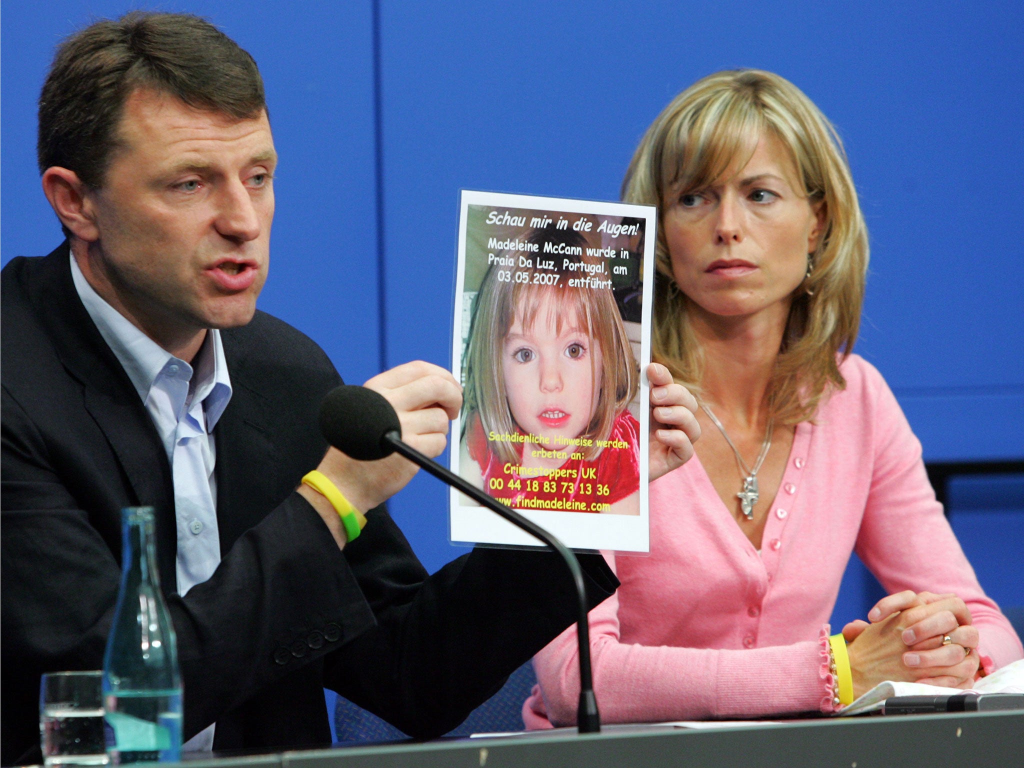 Kate and Gerry McCann display a poster of their missing daughter Madeleine McCann during a press conference on 6 June, 2007 in Berlin, Germany