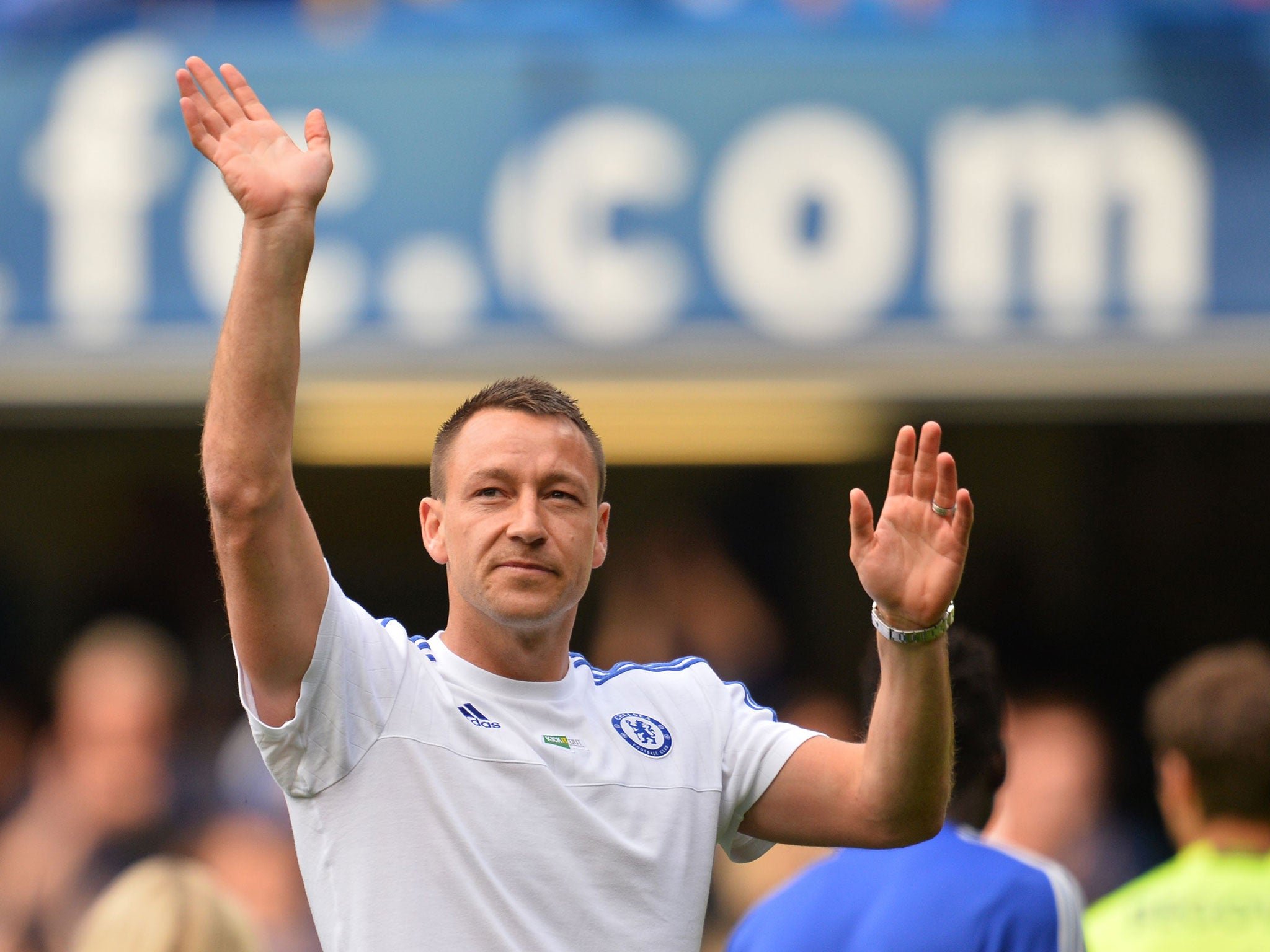 Terry waves to Chelsea fans after the final game of the season against Leicester