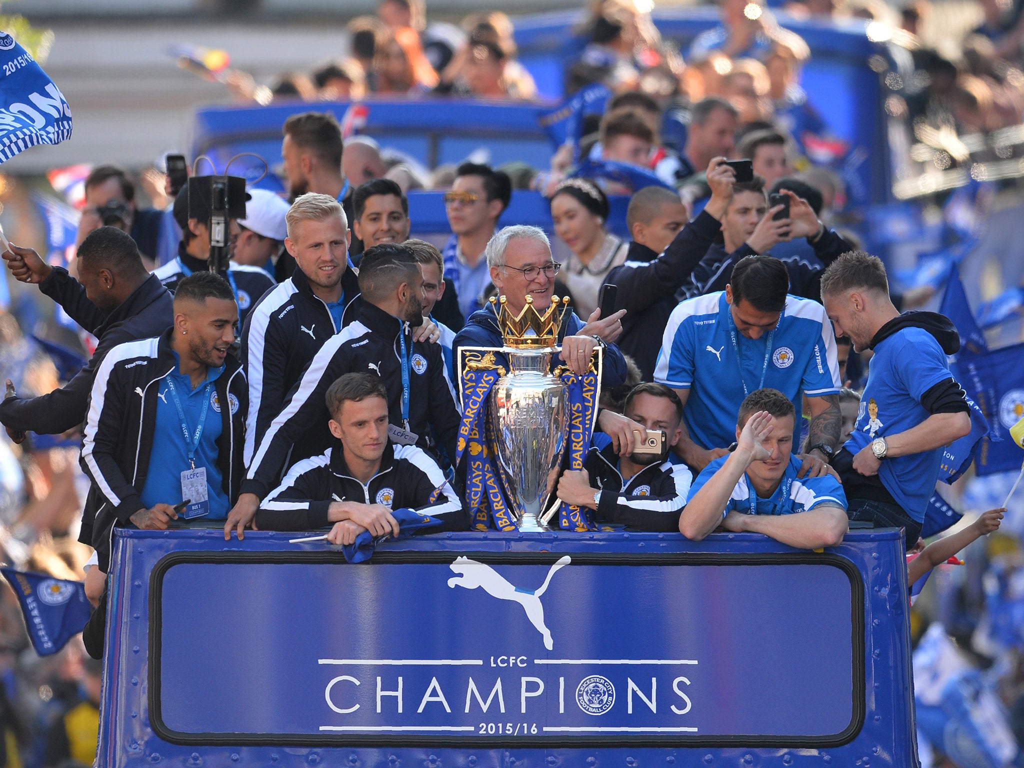 Claudio Ranieri leads Leicester's celebrations as the bus parade begins at Jubilee Square.