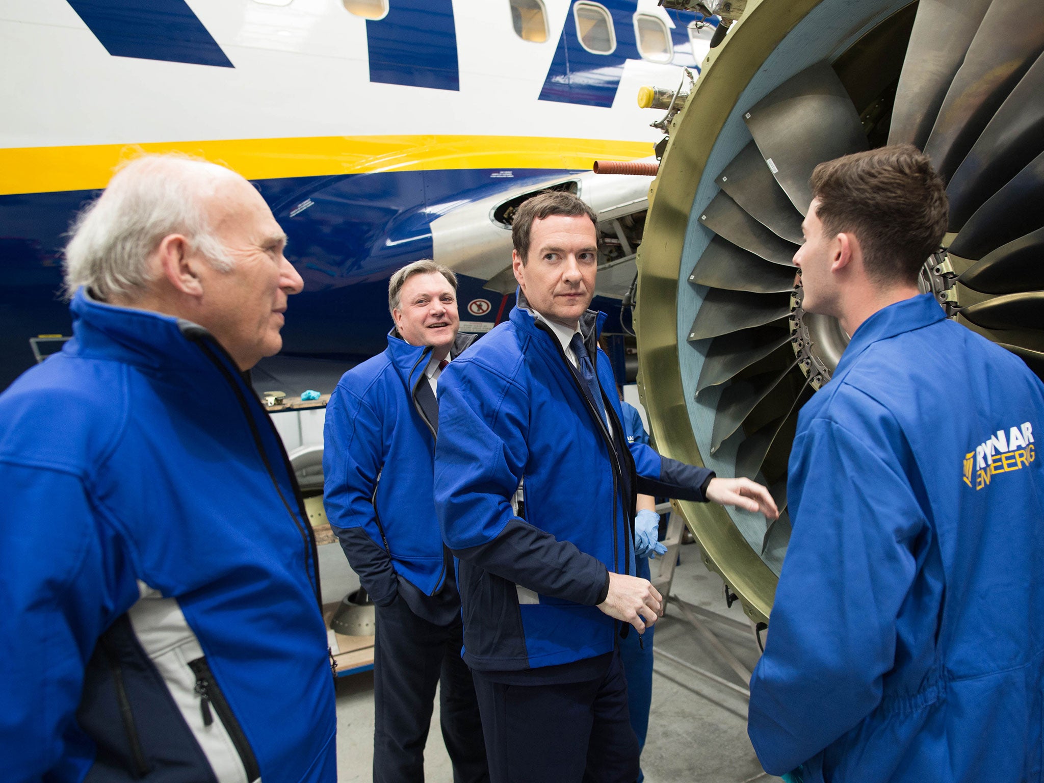 Sir Vince Cable, Ed Balls and George Osborne in the Ryanair hangar at Stansted Airport today