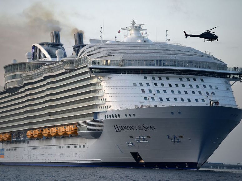 The world's largest passenger ship, MS Harmony of the Seas, owned by Royal Caribbean, makes her way up Southampton Water into Southampton ahead of  her maiden cruise