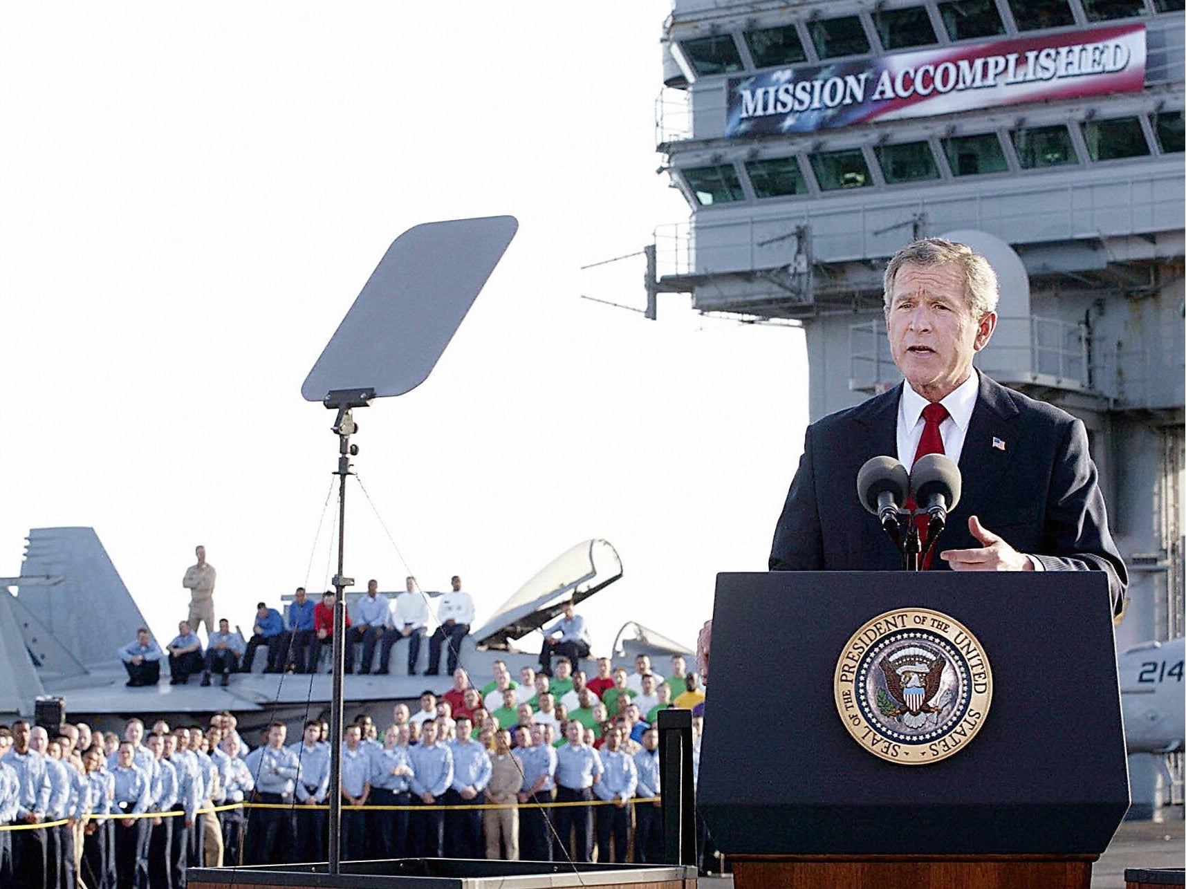 George W Bush aboard the aircraft carrier USS Abraham Lincoln during a speech in which he declared that major combat in Iraq was finished