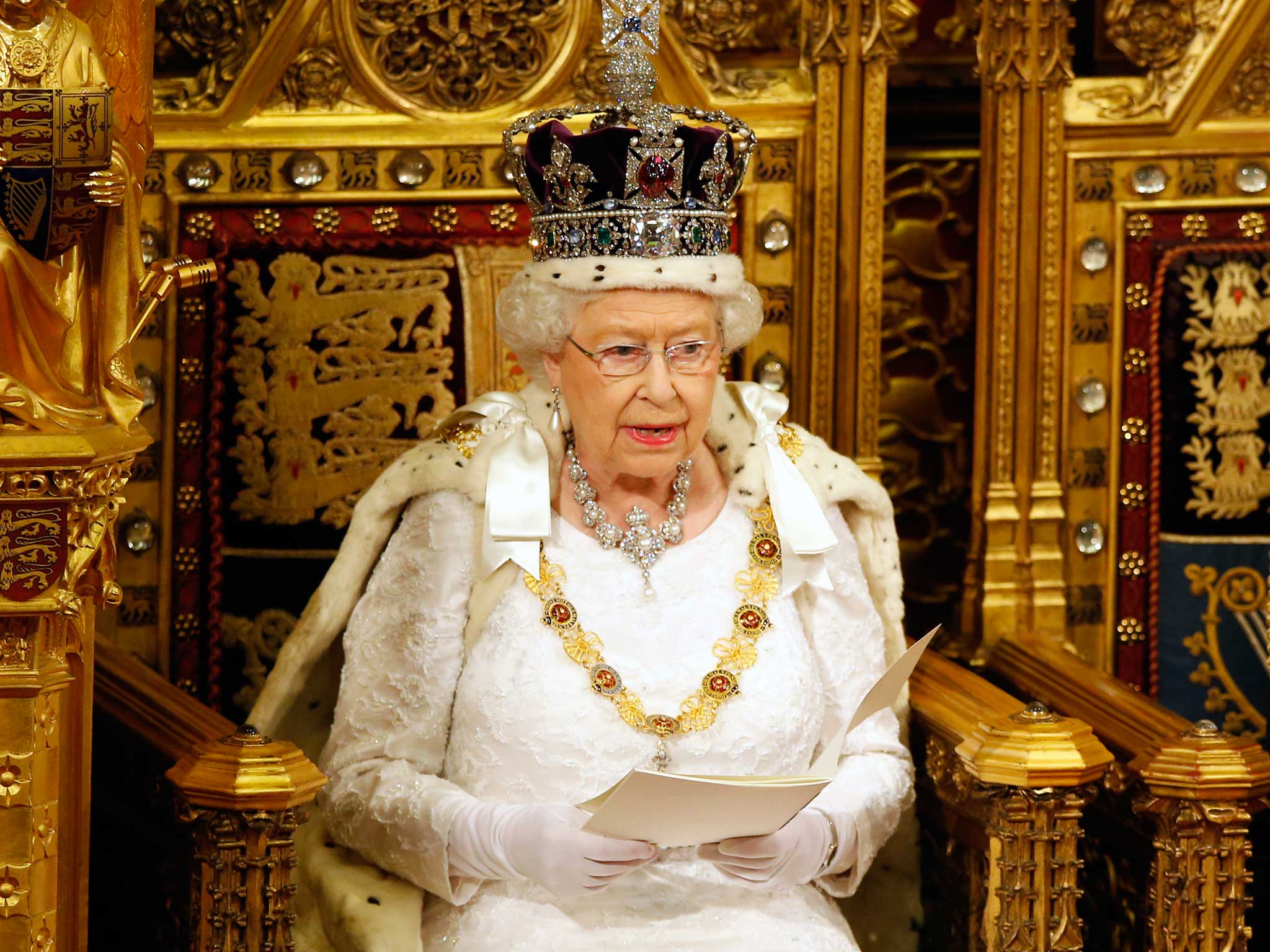 Britain's Queen Elizabeth II reads the Queen's Speech during the State Opening of Parliament in the House of Lords in London