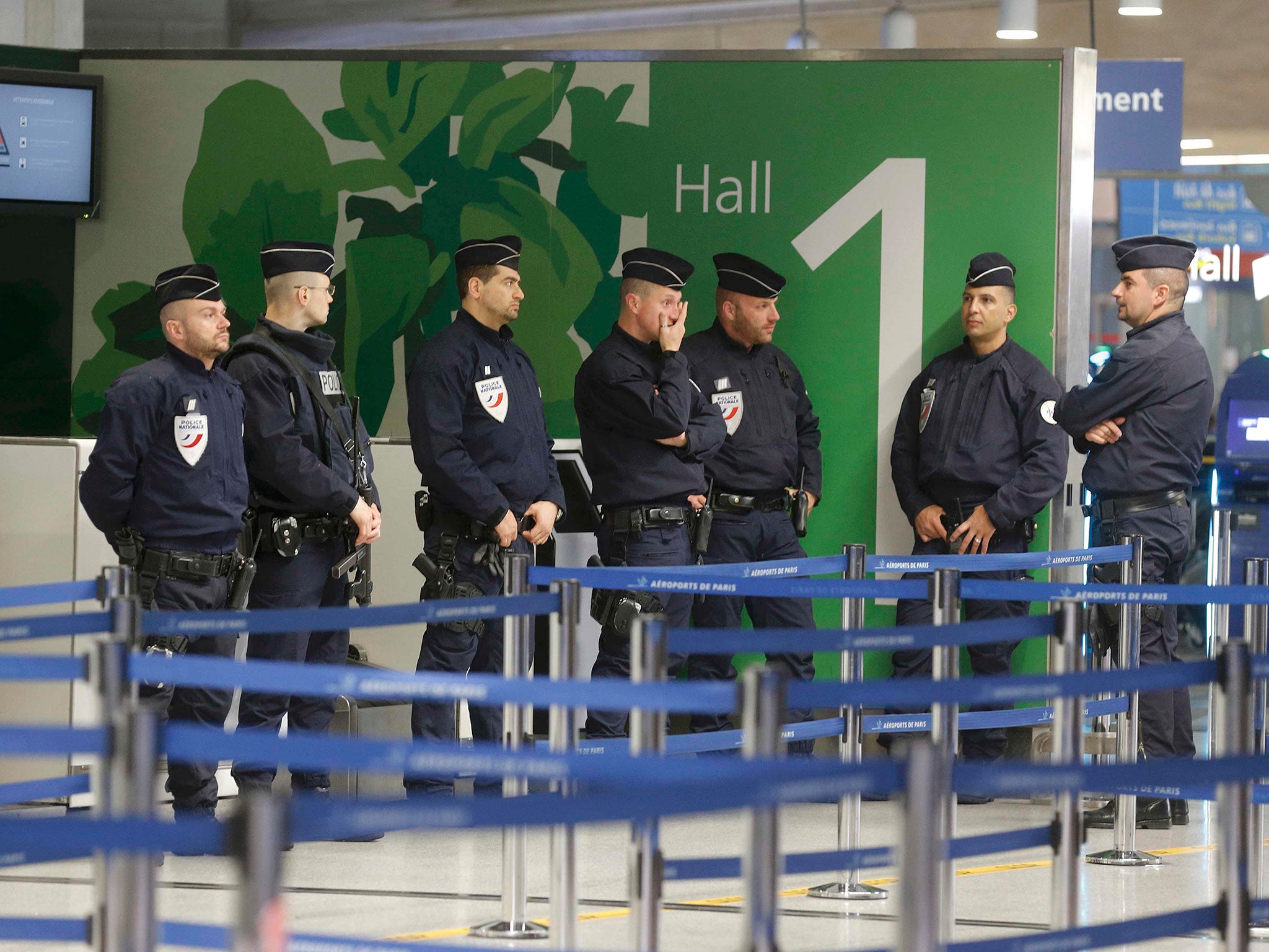 Police take up position at terminal 1 at Charles de Gaulle airport, after an Egyptair flight disappeared from radar during its flight from Paris to Cairo