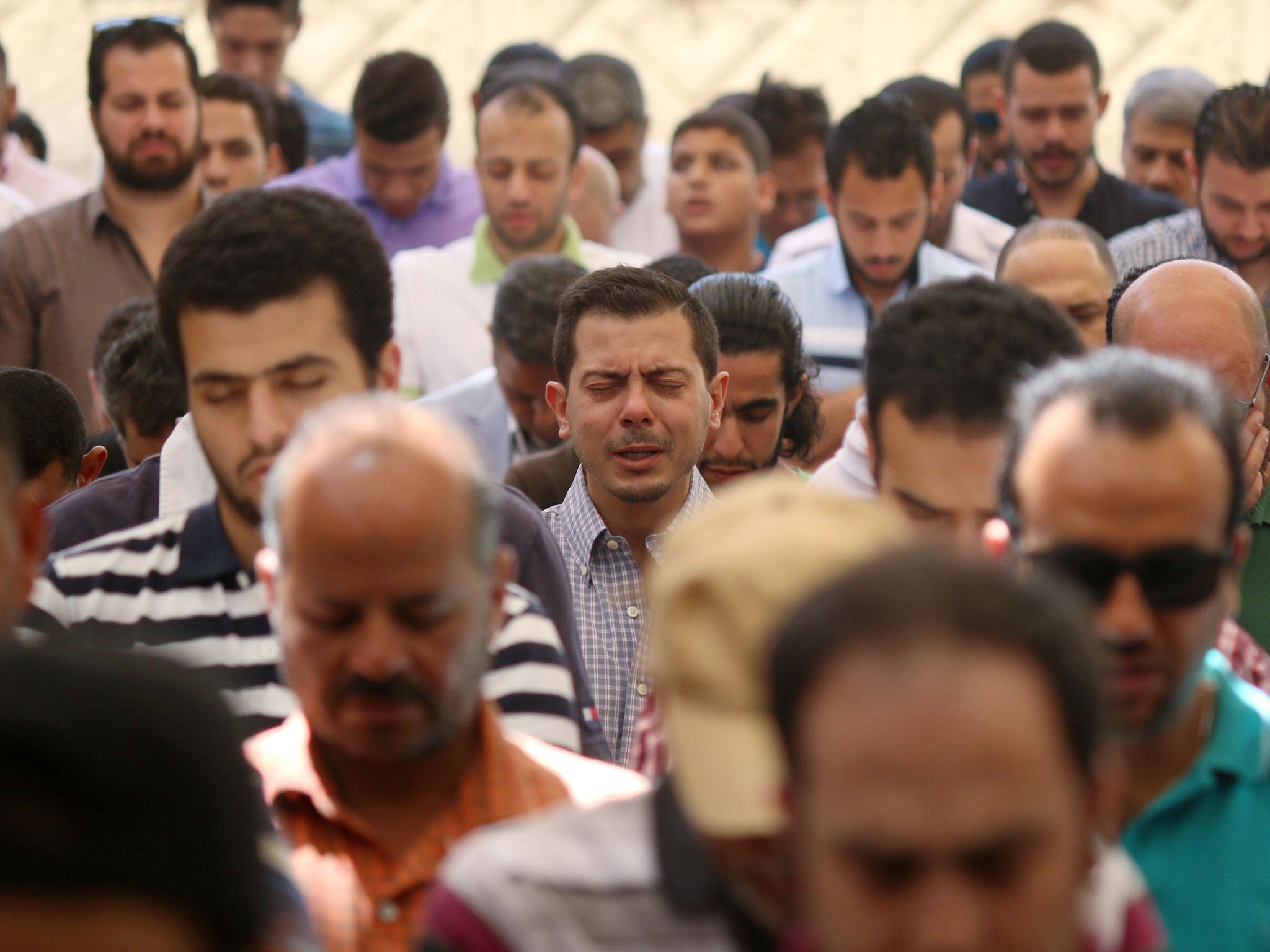 &#13;
Relatives and friends of passengers of the EgyptAir plane that crashed in the Mediterranean, pray on May 20, 2016 at Abu Bakr El Seddik mosque in Cairo. &#13;