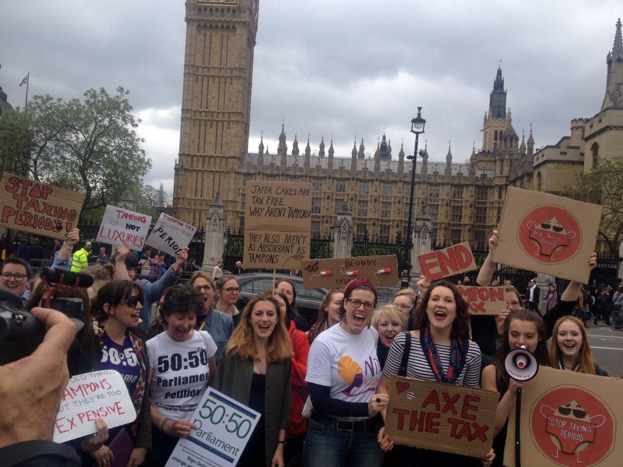 Around 50 people marched through Parliament Square chanting and holding banners in a bid put pressure on the Government to fulfil their pledge to remove the tampon tax