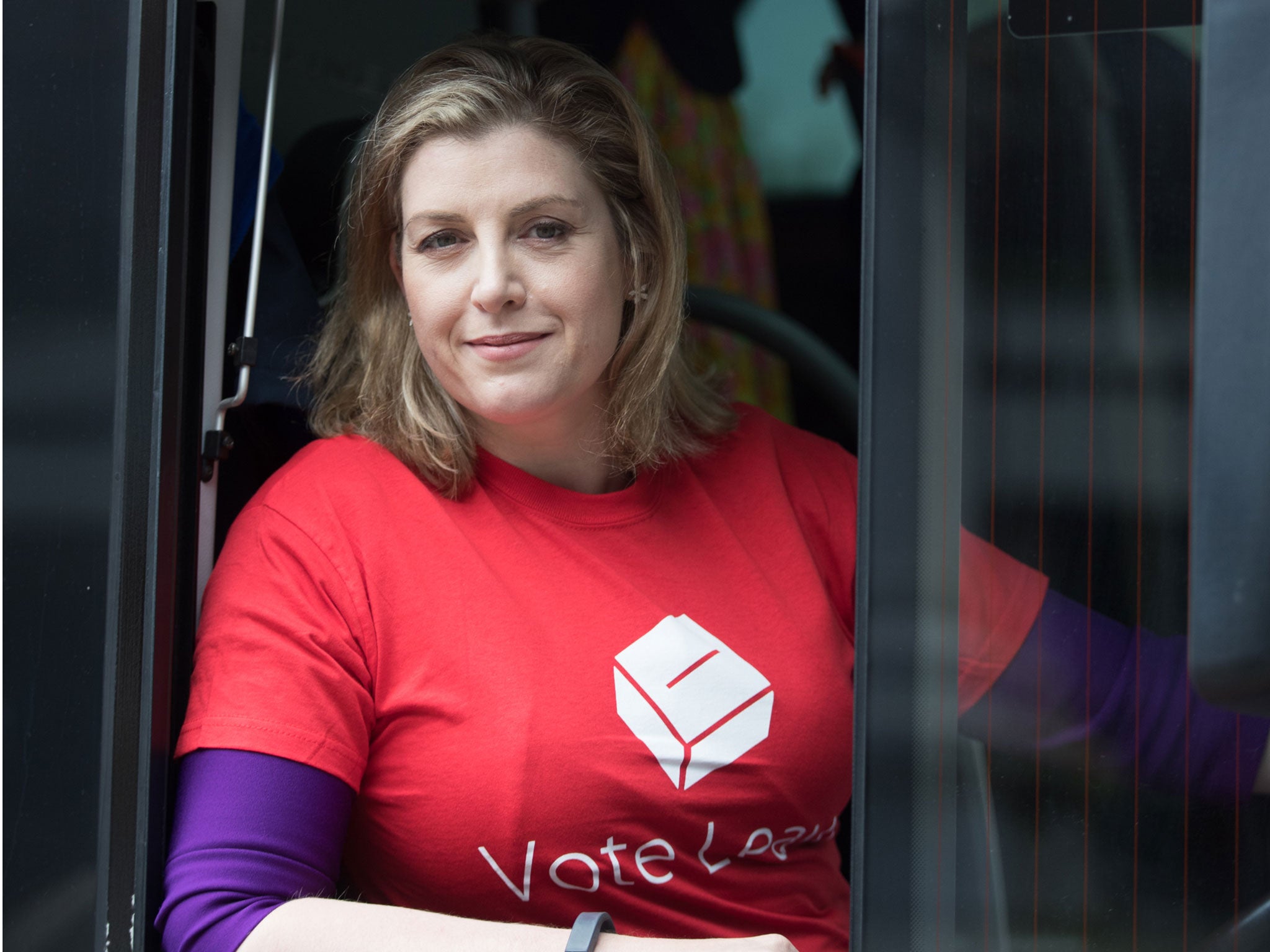 Penny Mordaunt, Minister of State for the Armed Forces and Conservative MP for Portsmouth North sits behind the wheel of the Vote Leave battle bus as it stops in Portsmouth on 13 May 2016