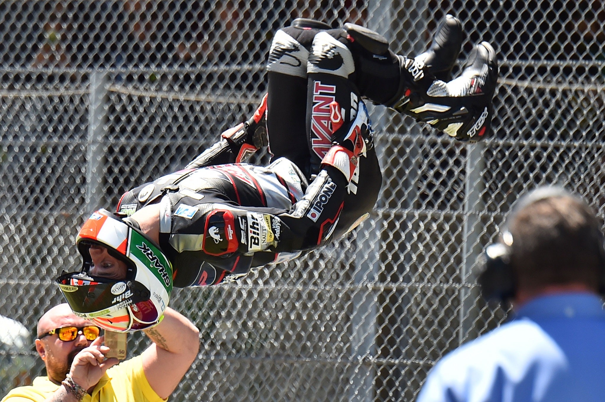 Johann Zarco performs his trademark celebratory backflip after winning the Moto2 race