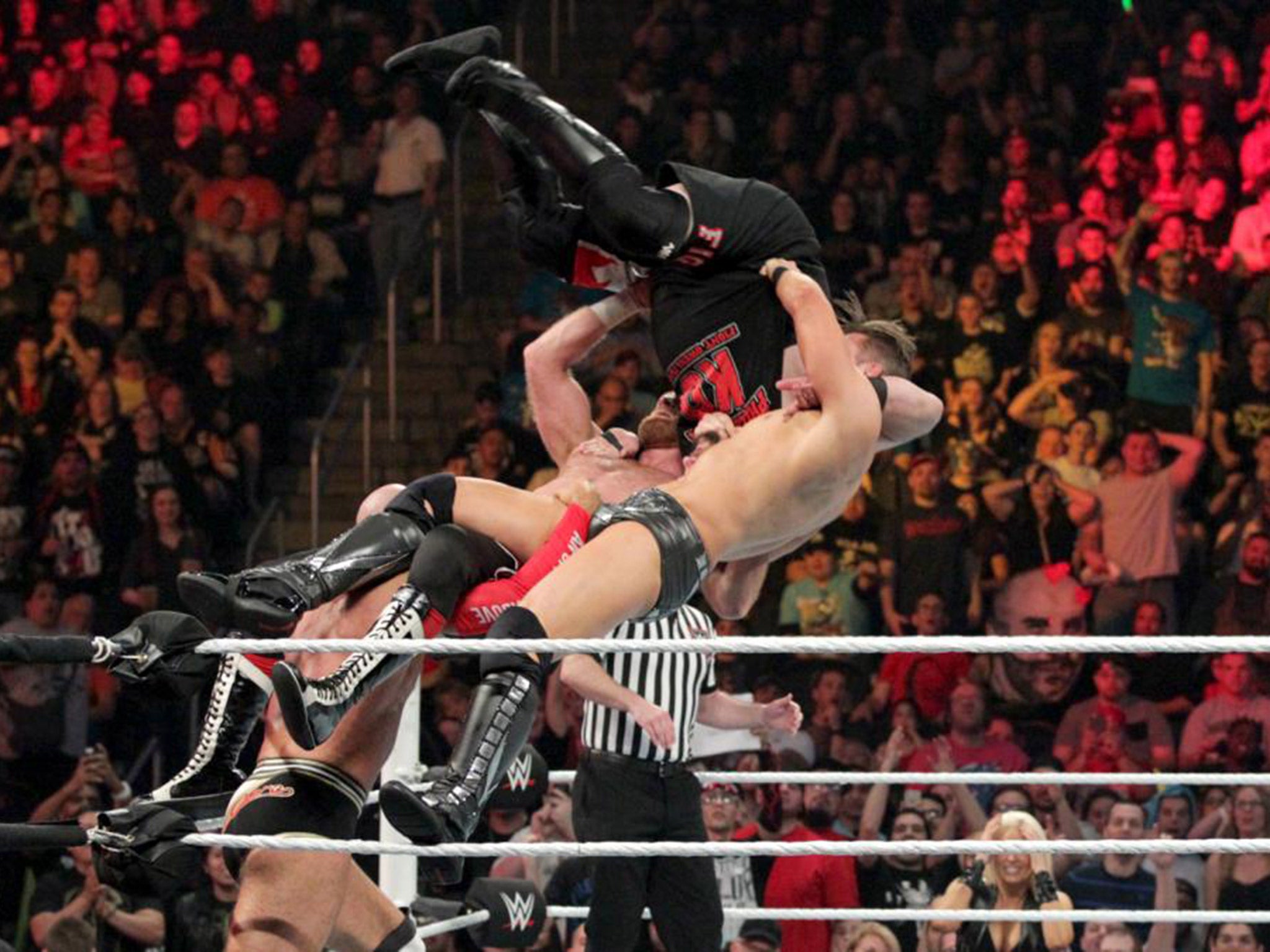 Cesaro, Sami Zayn and The Miz team up to suplex Kevin Owens