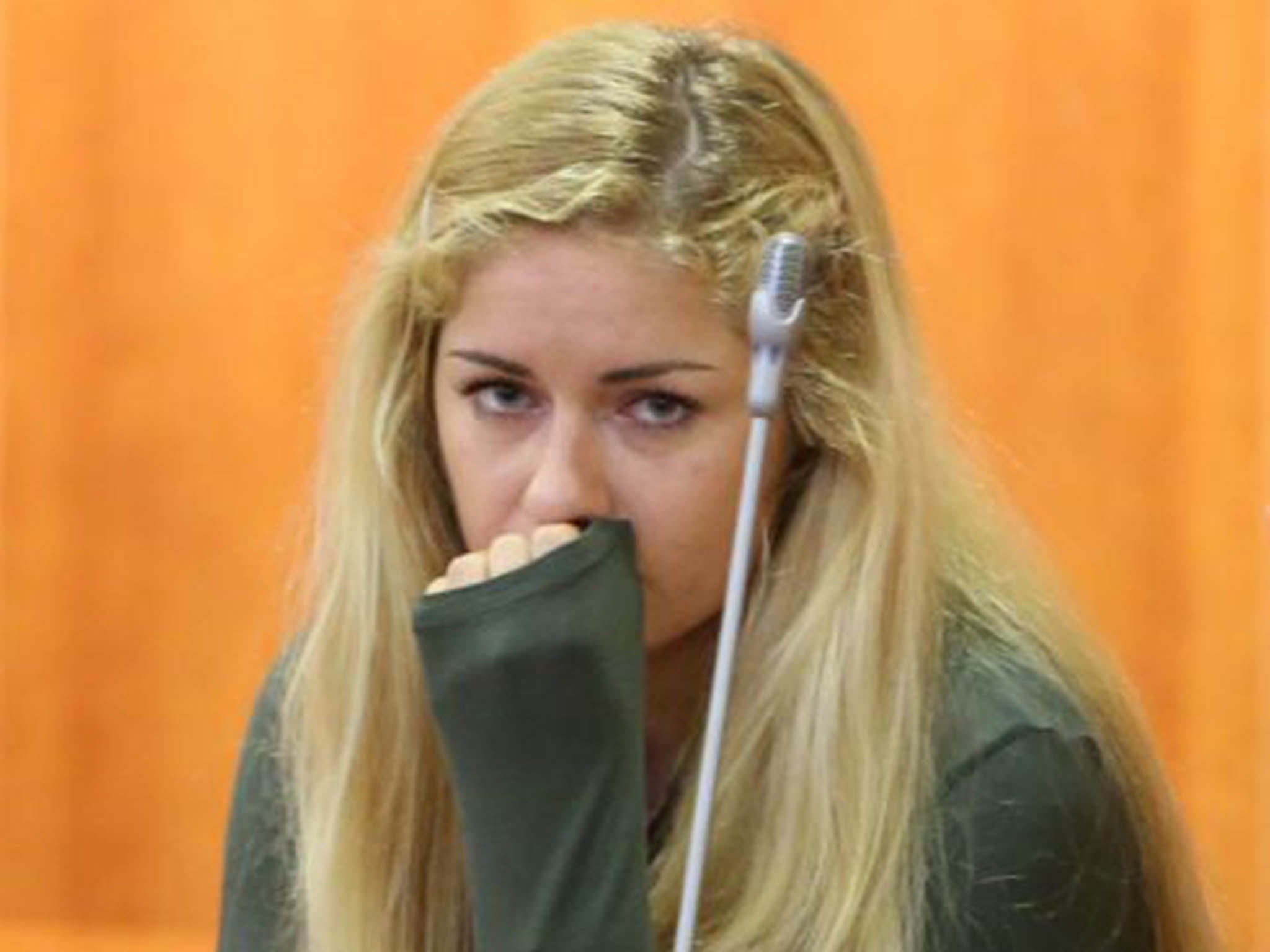 Mayka Marica Kukucova appears in court in Malaga, Spain, where she is accused of killing her former partner, British millionaire Andrew Bush