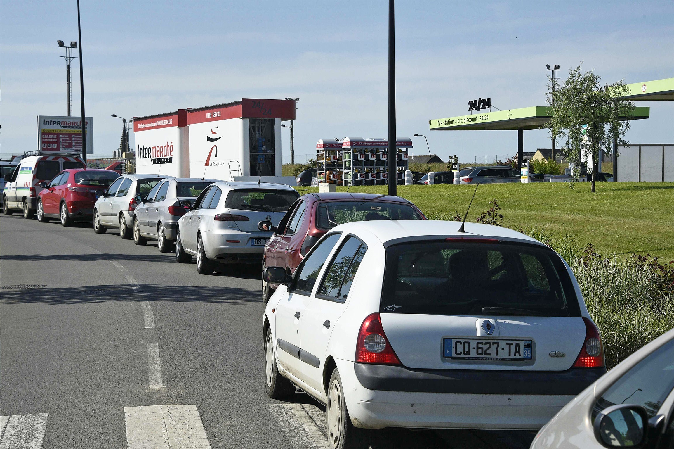 Motorists queuing at a petrol station in Combourg, western France