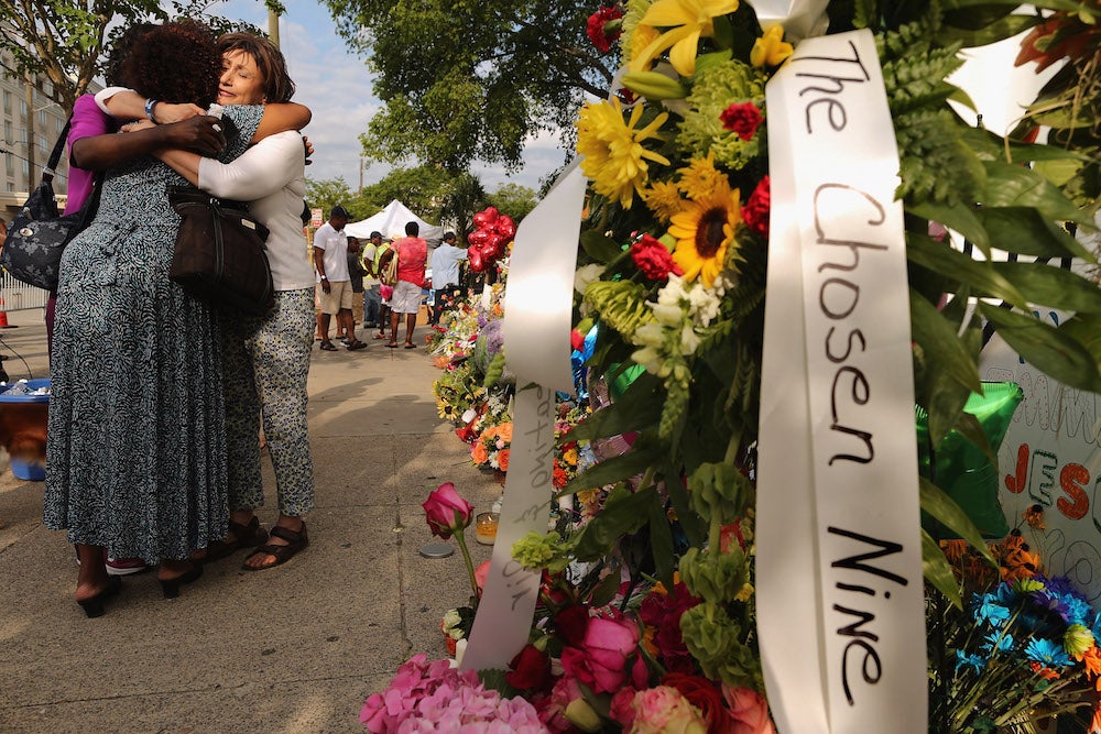 People mourn outside the Emanuel African Methodist Church on June 20, 2015.