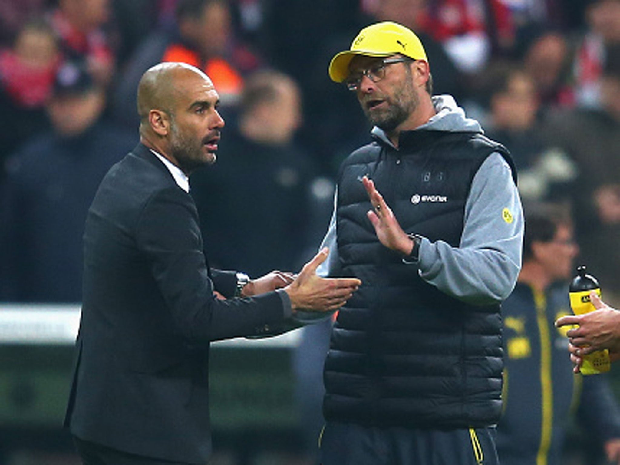 Jurgen Klopp and Pep Guardiola will meet up again in England next season (Getty)