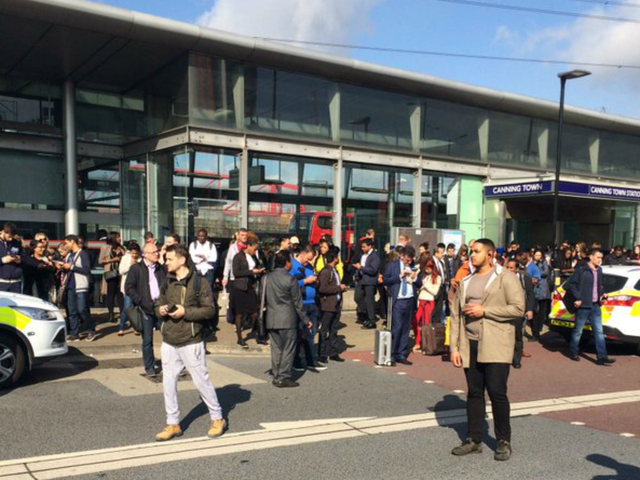 Canning Town station was evacuated after a woman's leg became trapped between a Tube train and the platform on 26 May