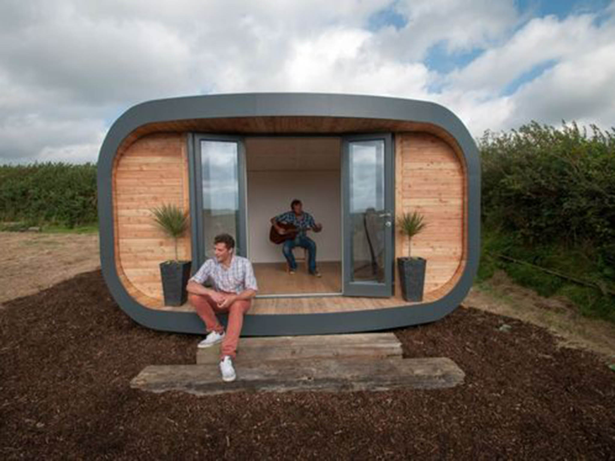 The completed eco-hubb with Max sitting outside