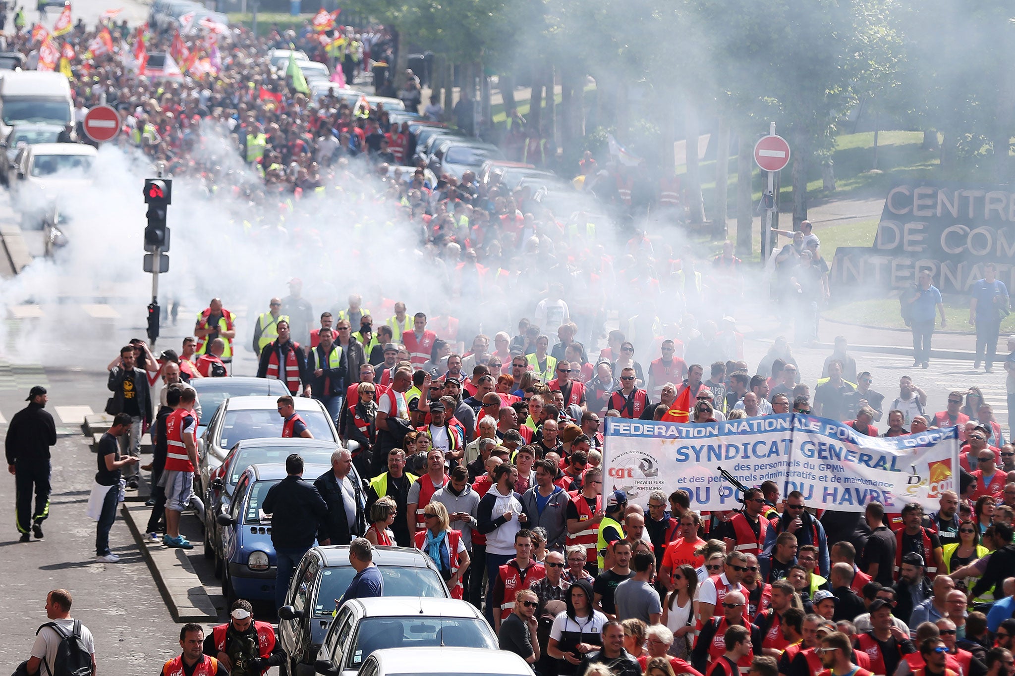 French dock workers protest new labour laws in the port city of Le Harve