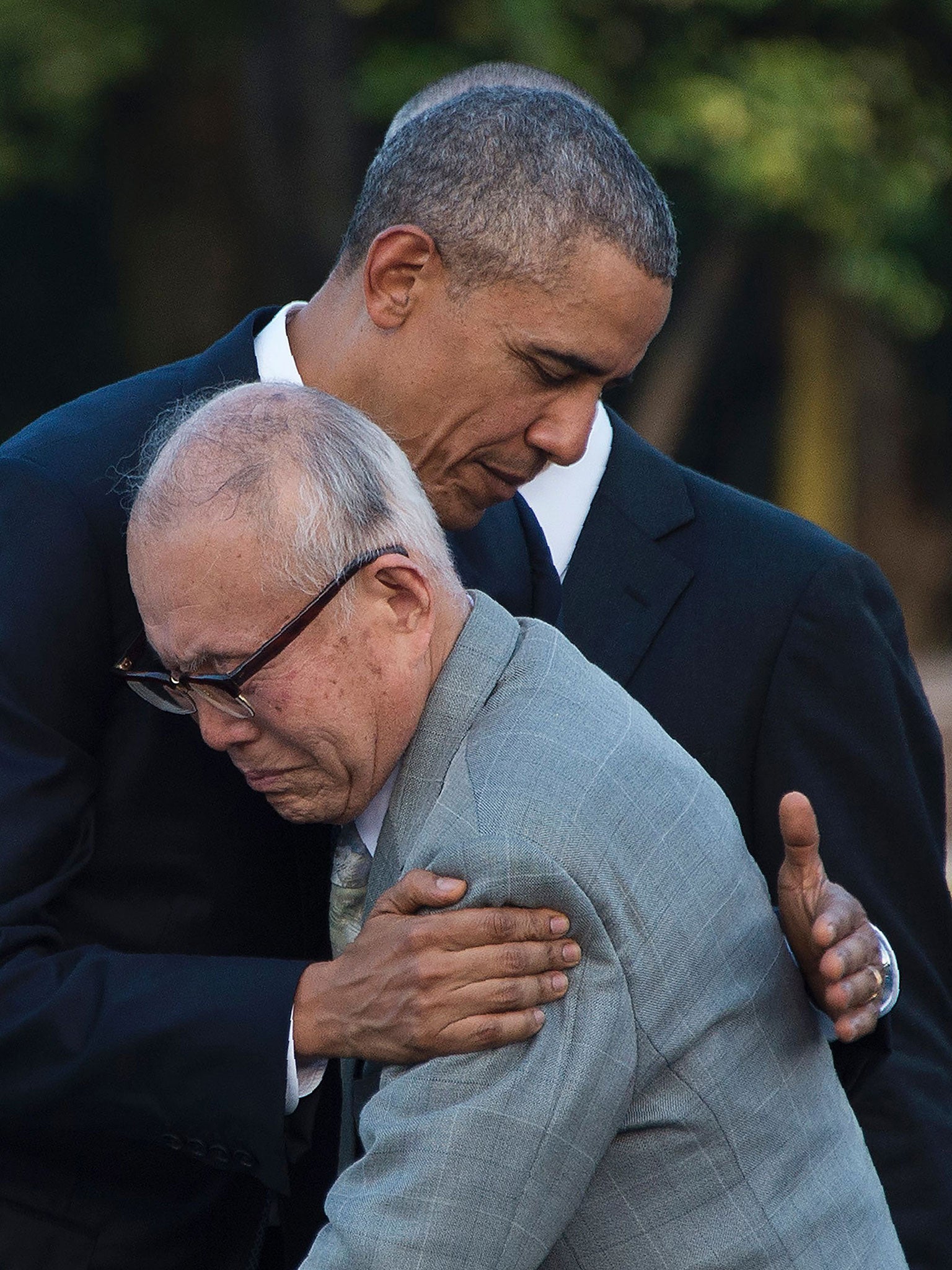 US President Barack Obama hugs Shigeaki Mori, a survivor of the 1945 atomic bombing of Hiroshima