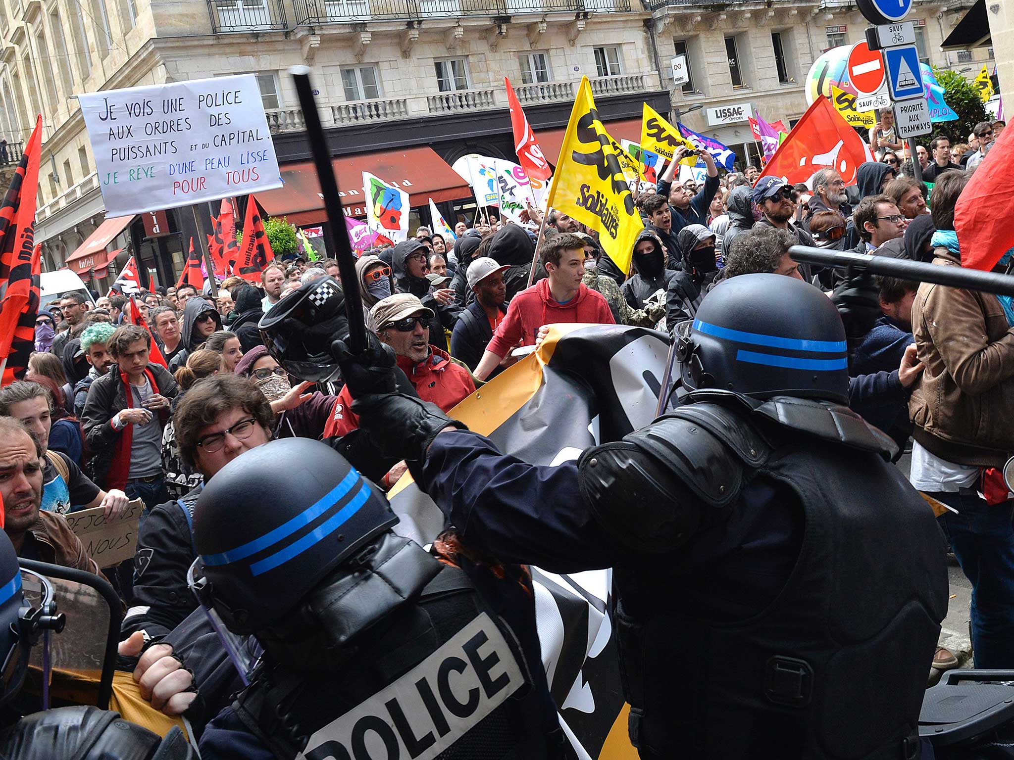 Security forces clash with demonstrators during a protest in Bordeaux