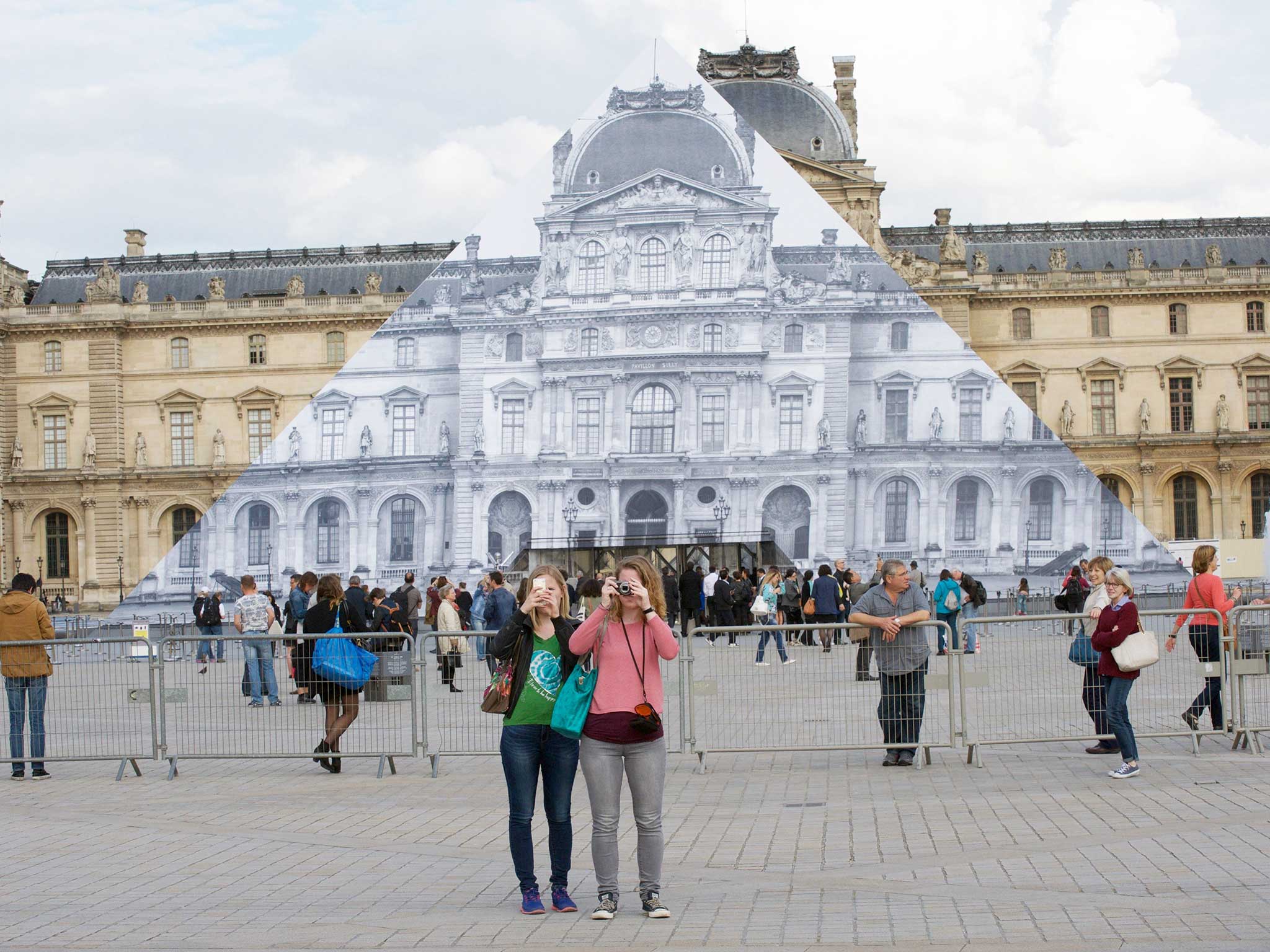 Louvre Museum covered by a JR installation