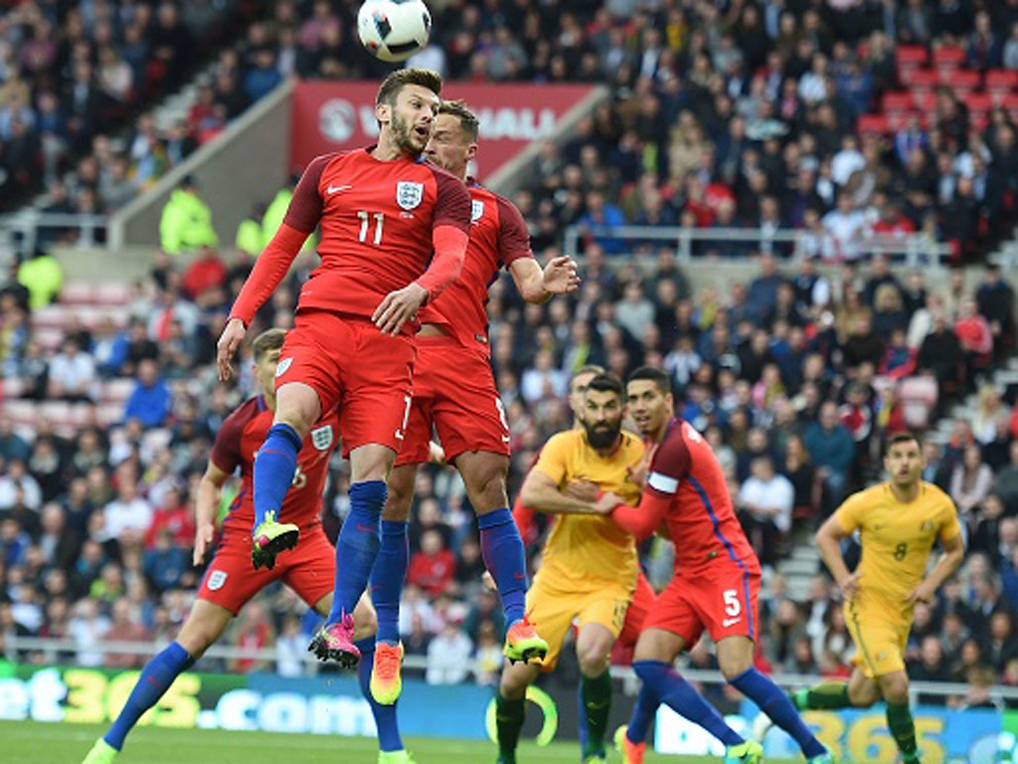 Adam Lallana challenges for a header as England took on Australia in Sunderland on Friday night (Getty)