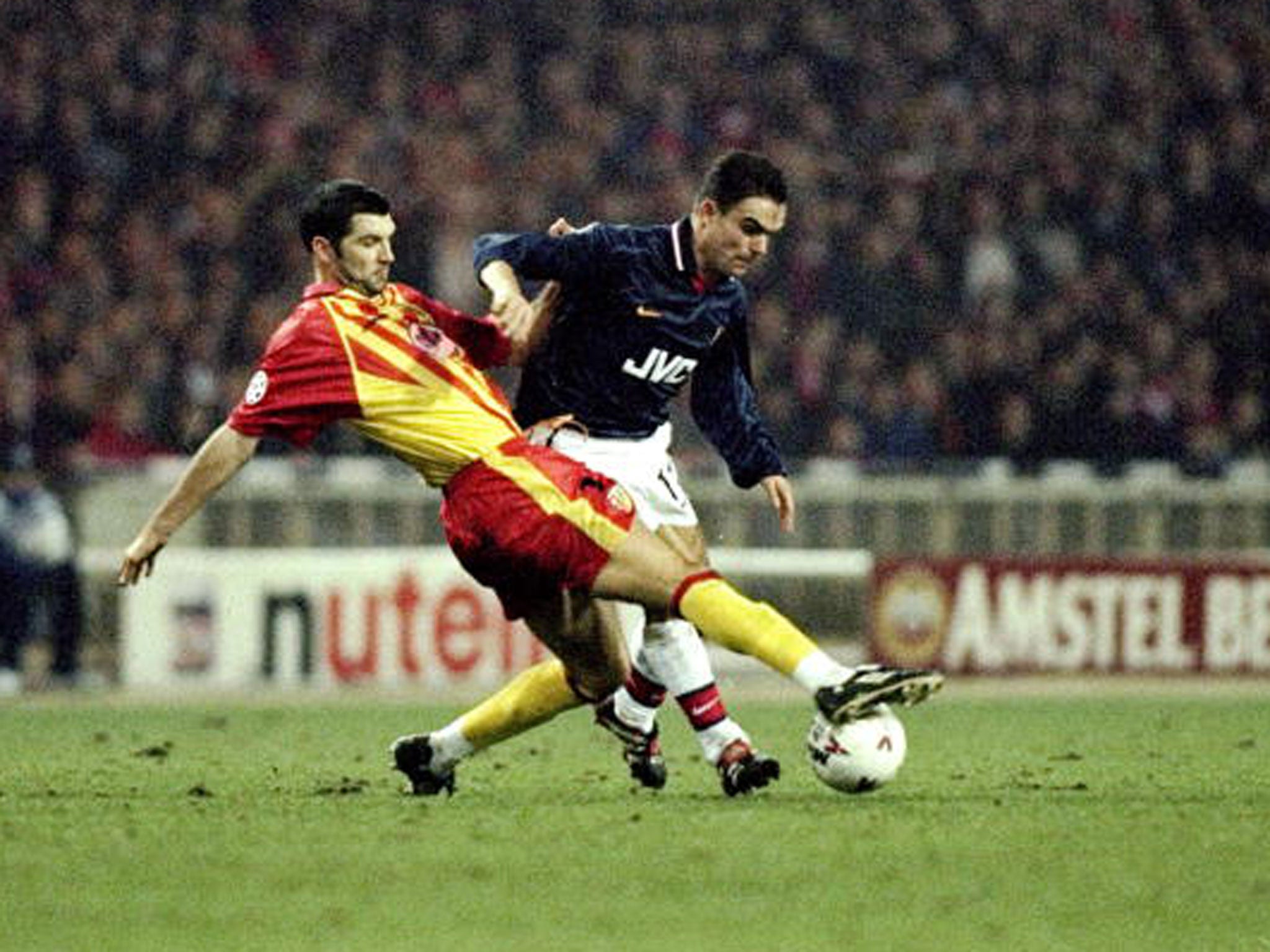 Marc Overmars competes for the ball against Lens as Arsenal finished their Wembley campaign with a defeat in 1998 (Getty)