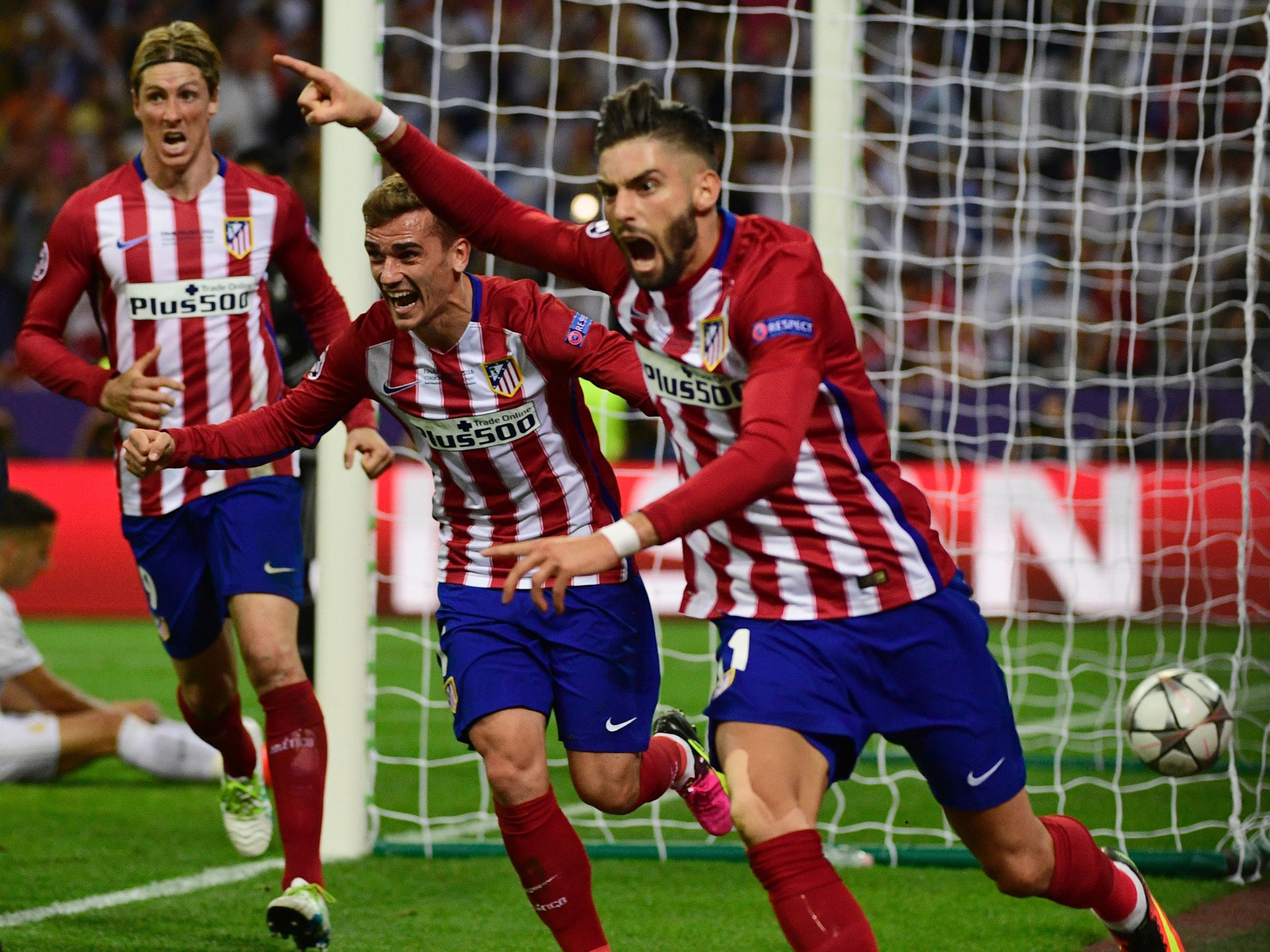 Carrasco celebrates his late equaliser which sent the game to extra time