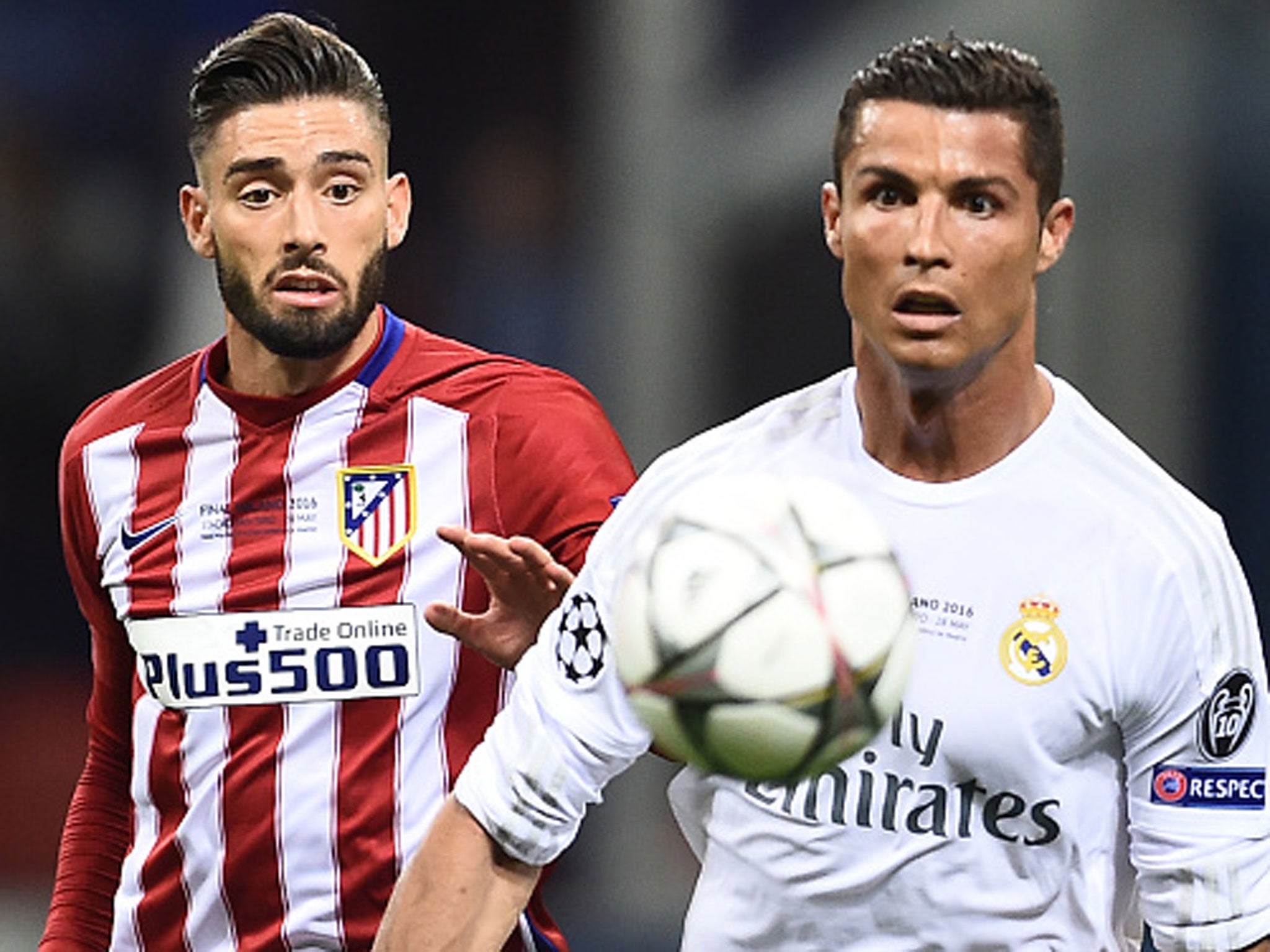 Atletico scorer Yannick Carrasco closes down Real Madrid's Cristiano Ronaldo during Saturday's Champions League final in Milan (Getty)