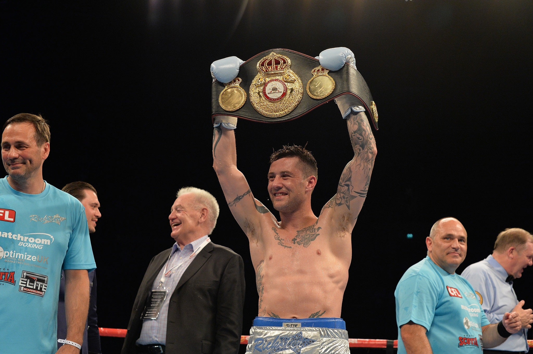 Ricky Burns celebrates winning the WBA super-featherweight title