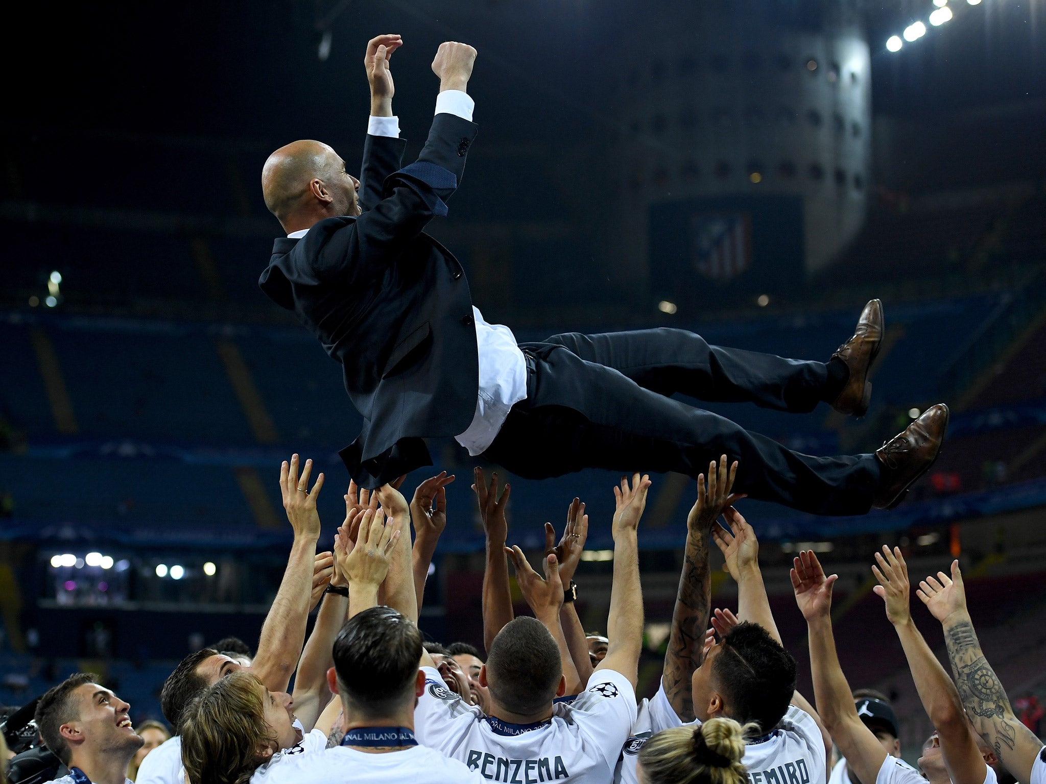 Zinedine Zidane is given the 'bumps' by his Real players