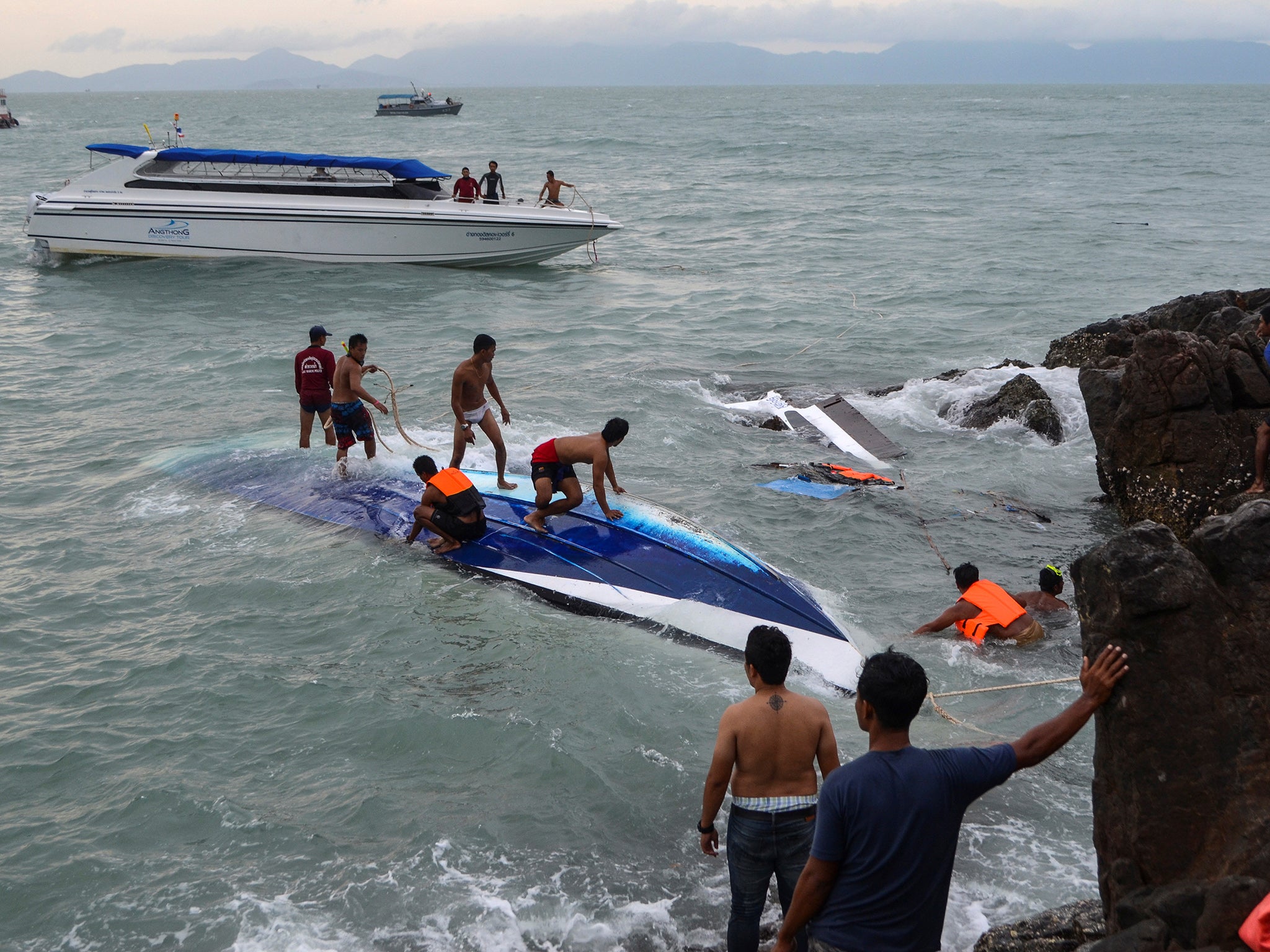 Rescue workers search for victims after the accident