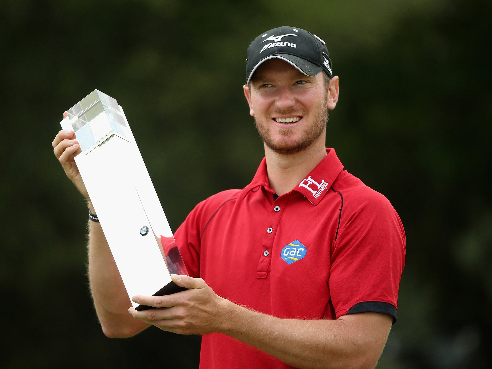 Chris Wood celebrates winning the BMW PGA Championship