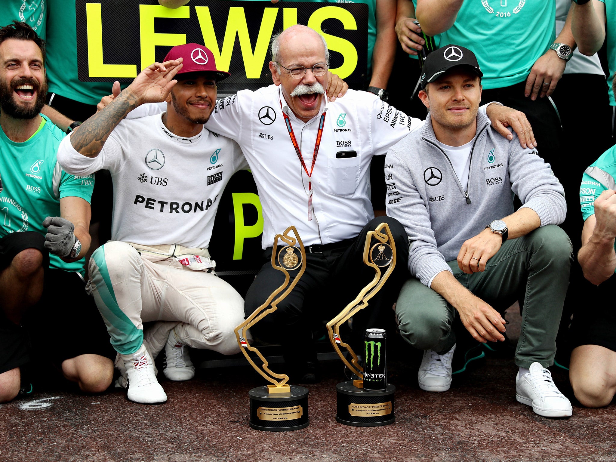 Lewis Hamilton celebrates his Monaco Grand Prix victory with Head of Mercedes-Benz Cars Dieter Zetsche and Nico Rosberg