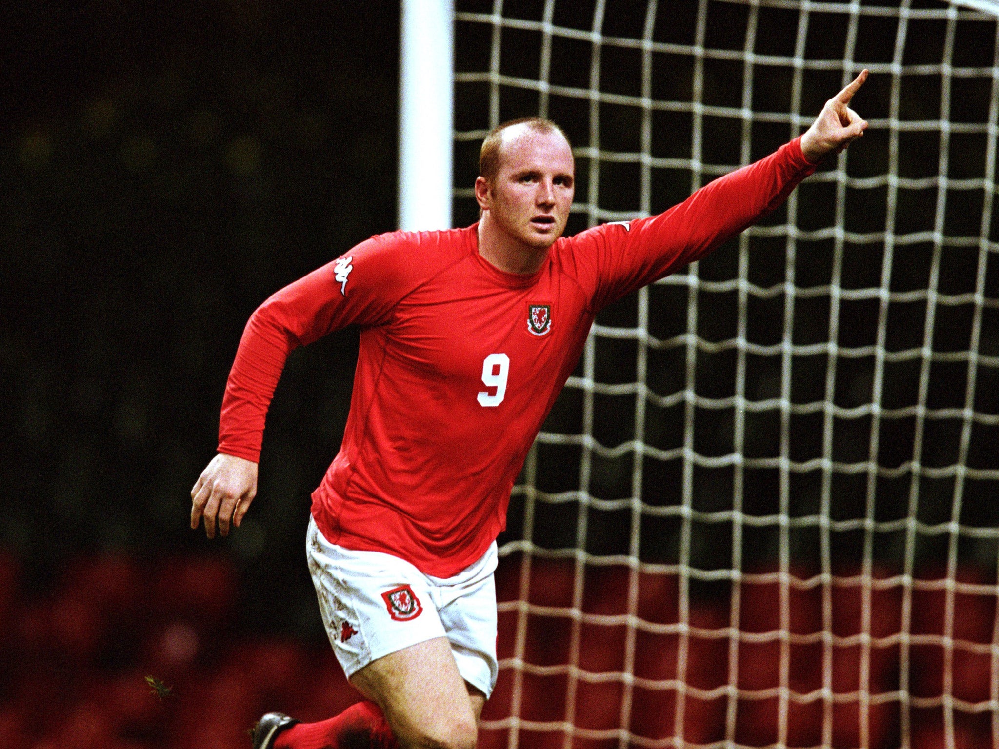 John Hartson celebrates scoring for Wales against Belarus in 2001