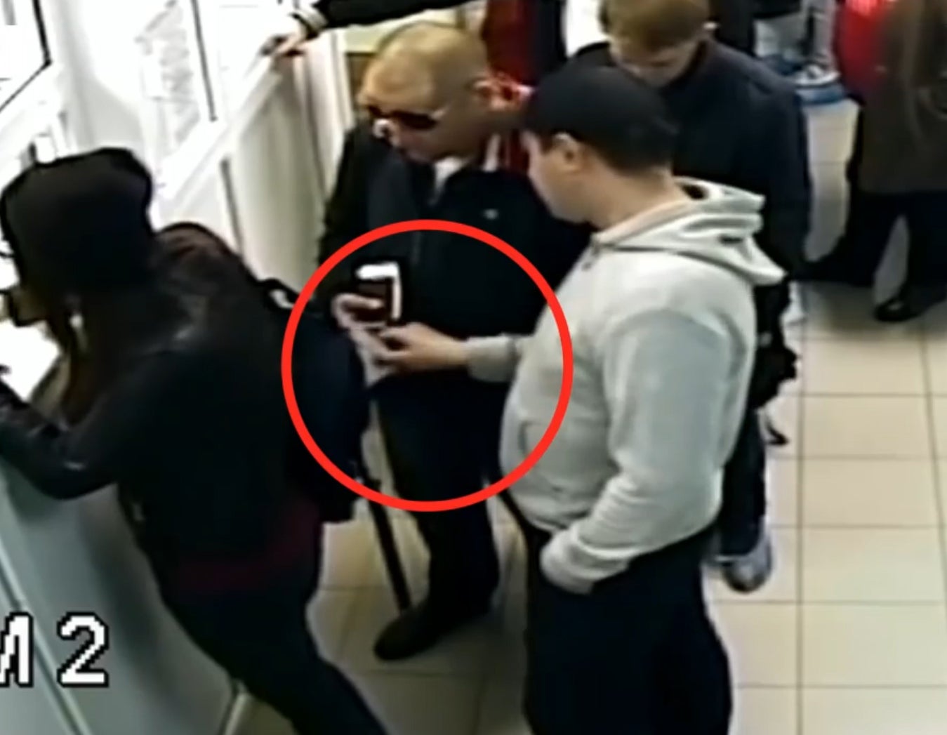 Pickpocket caught on CCTV robbing an unsuspecting queue-jumper