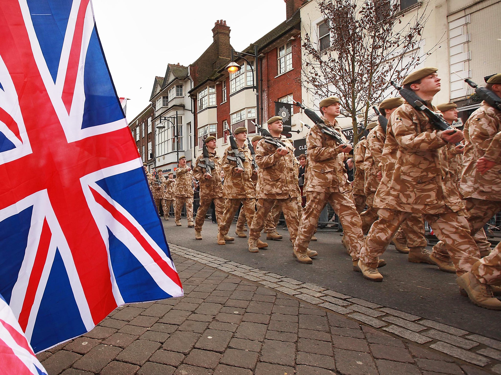 Soldiers from the The Royal Anglian Regiment parade through Watford