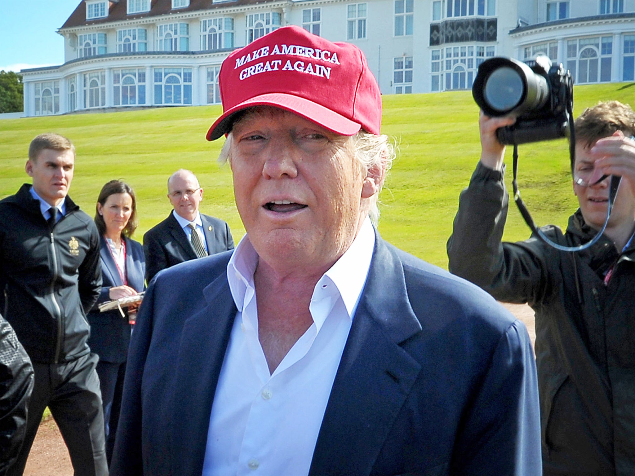 Mr Trump will be attending the official reopening of his golf course in Scotland