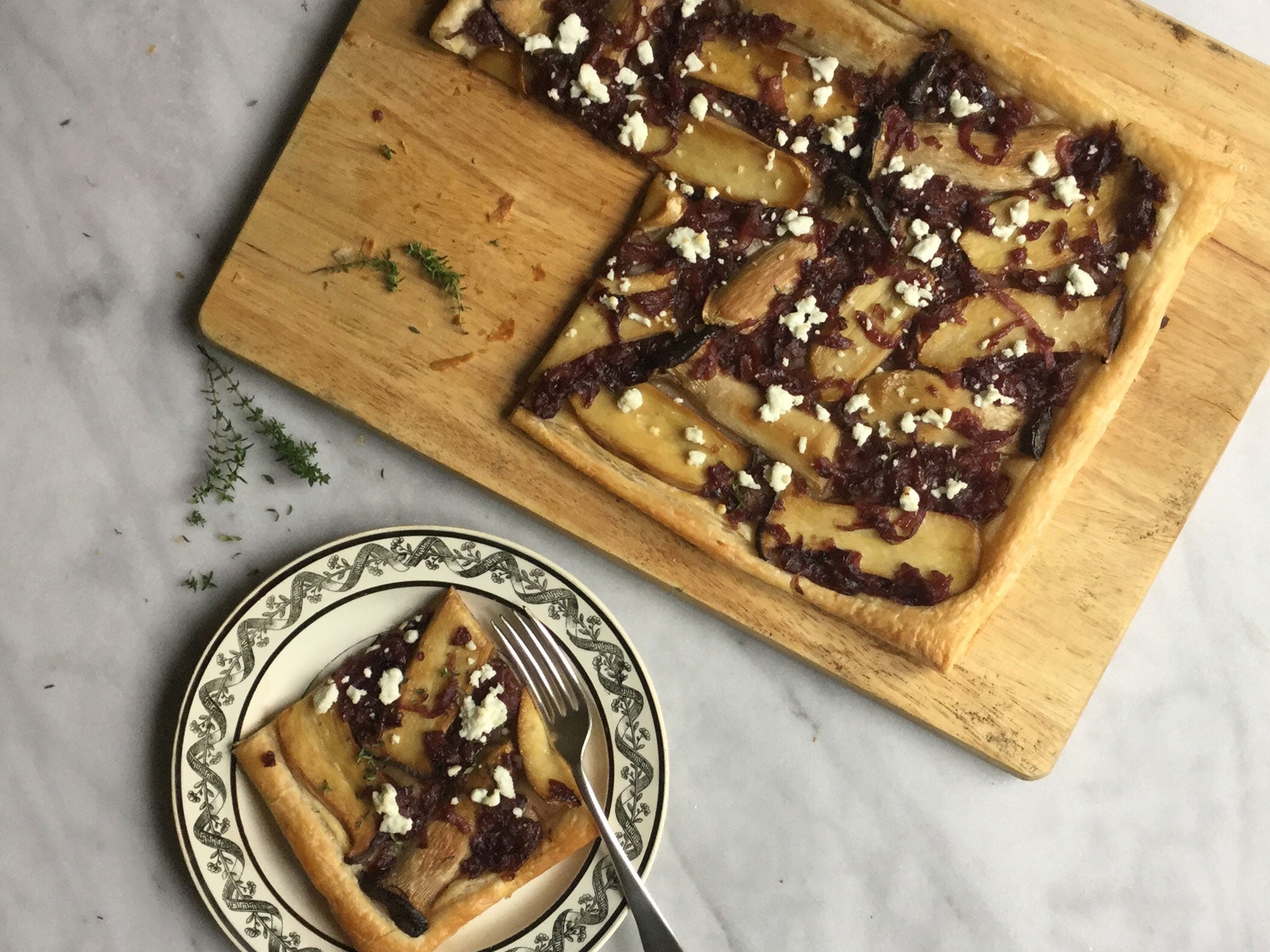 Julia’s tart is topped with king oyster mushrooms, caramelised onions, goat's cheese and fresh thyme