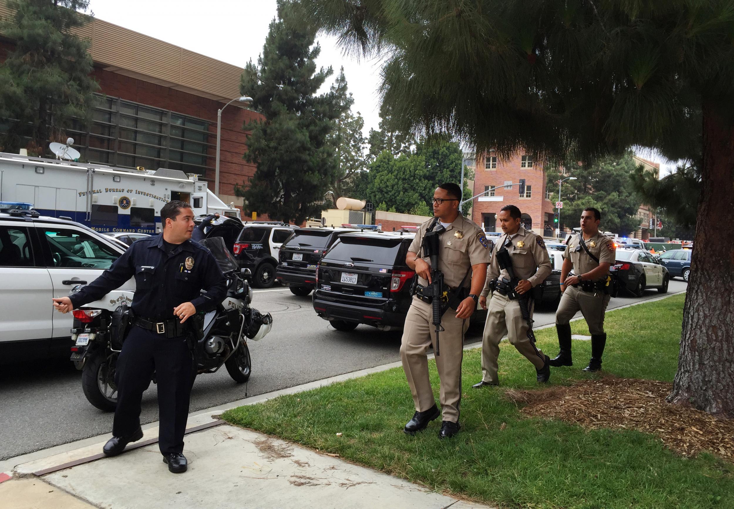 LAPD officers respond to the fatal shootings at UCLA