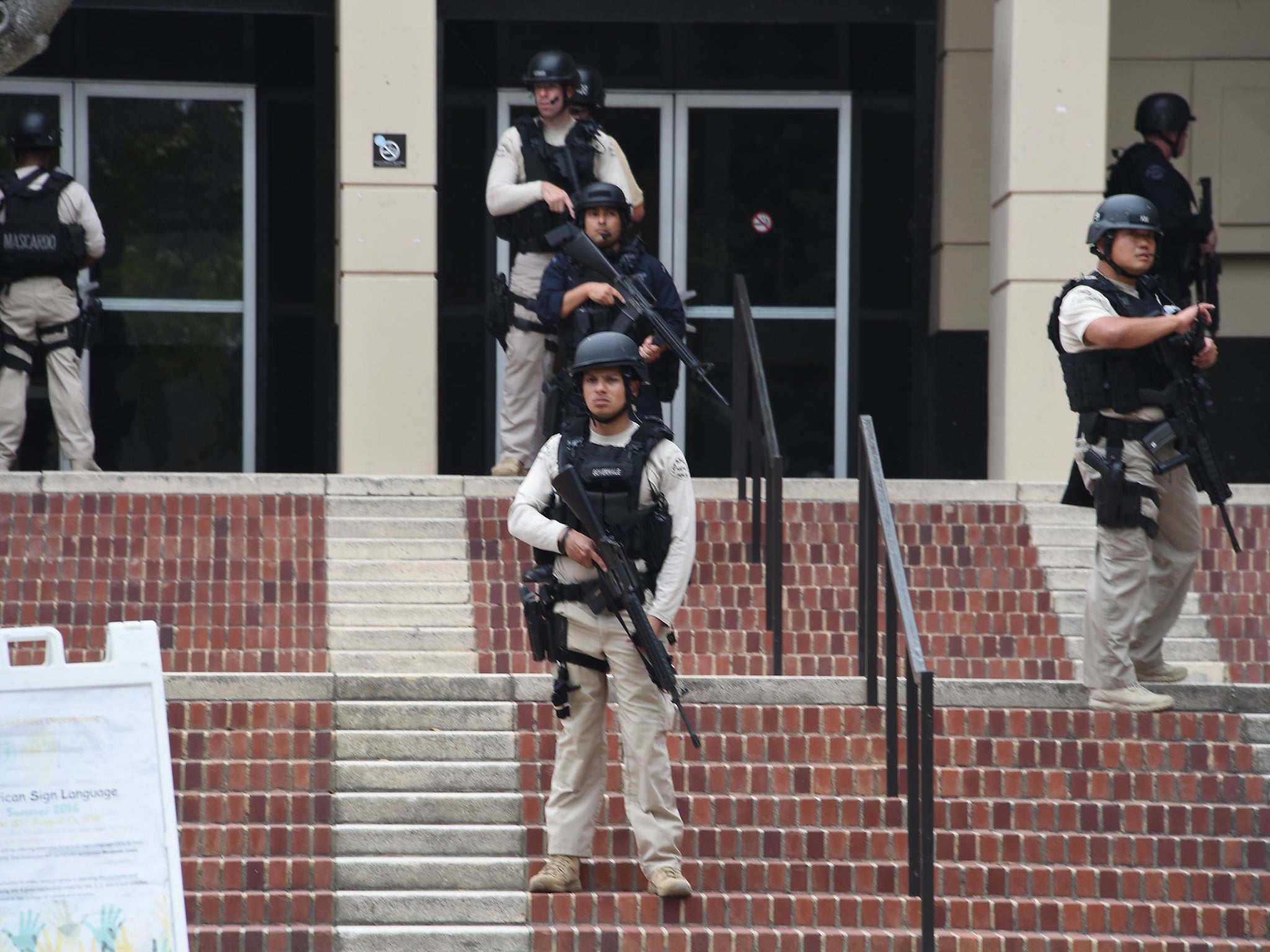 Members of security at the University of California's Los Angeles campus following the shooting