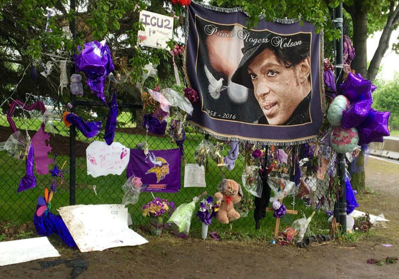 Fans have left tributes outside the musician's Minneapolis home