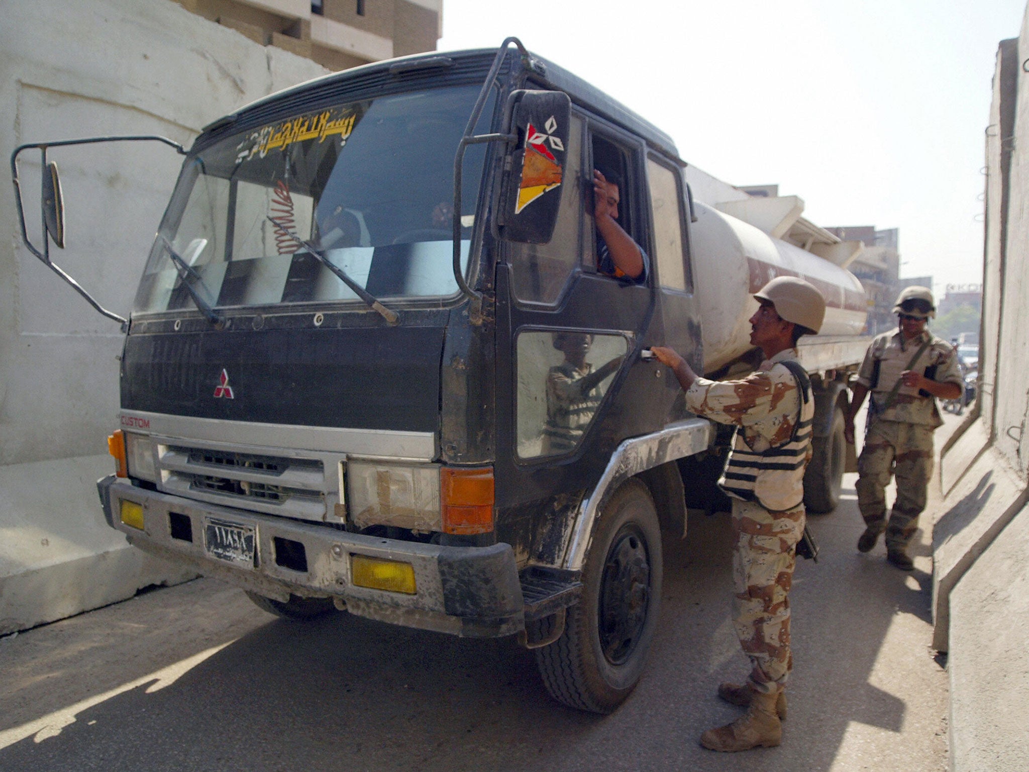 Levying charges on vehicles passing through checkpoints is one of Iraq’s most remunerative rackets