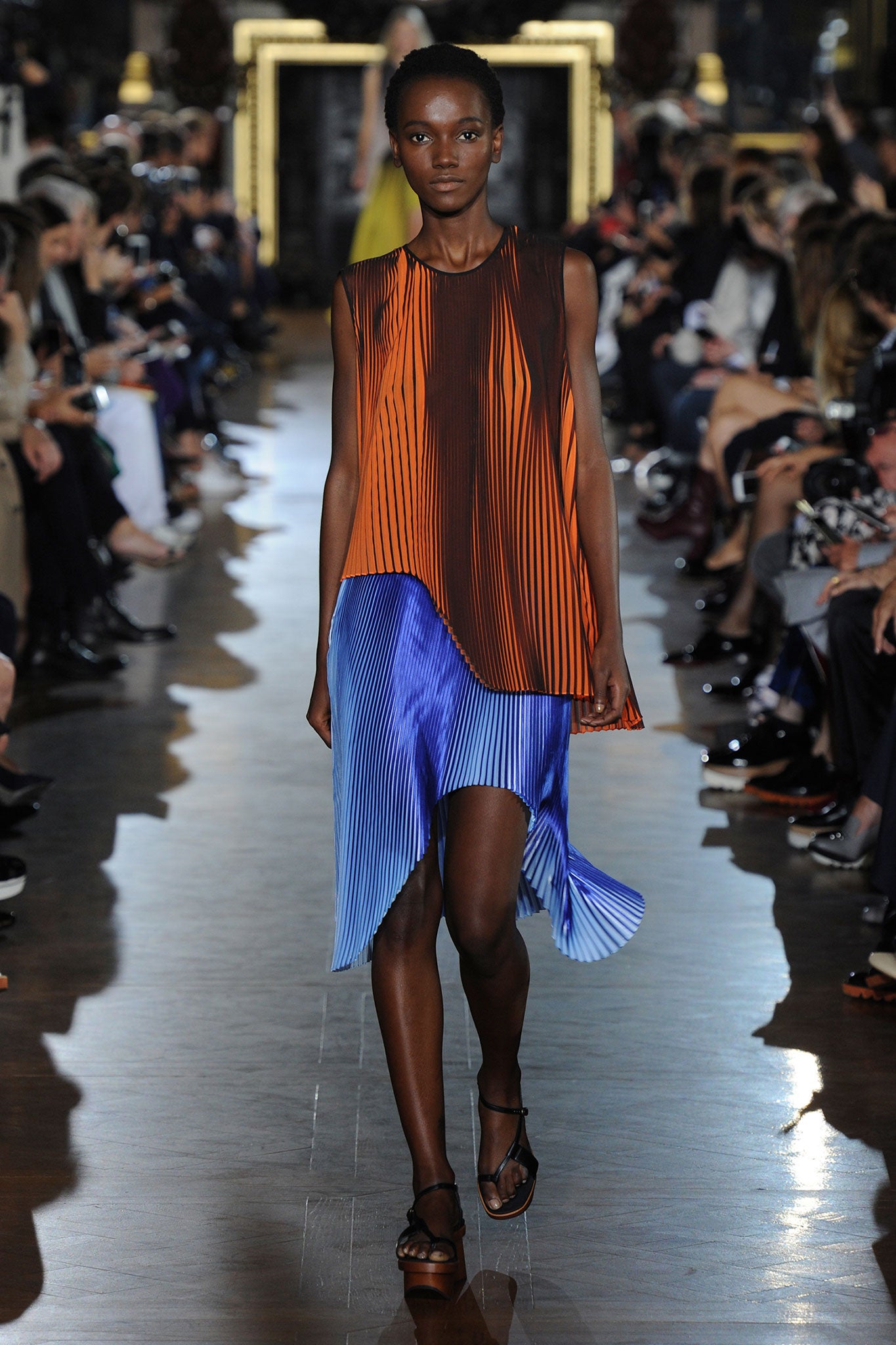 For Stella McCartney, an adult makeover meant working in a little flair with asymmetric hemlines and metallic flashes